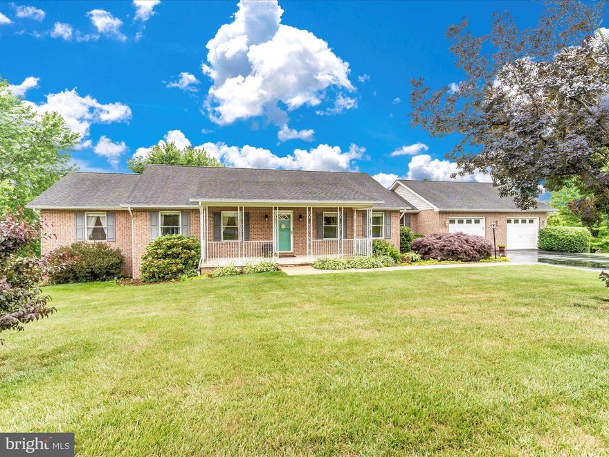 Enjoy the picturesque mountain views in this custom built 4 bedroom, 3 bath ranch style home.  There is spacious one-floor living of 2232 sq. ft. on the main level.  Also, included is a fully finished walk-out basement, located on 1.5 acres with an oversized two car garage that includes plenty of driveway parking,. This home has been well maintained with gleaming wood floors on the main level, solid cherry-wood kitchen cabinets and clear finish wood trim throughout.  Spacious master bedroom with double closets, large master bath with soaking tub and double sinks.  Open living room/dining room leads out to an enclosed seasonal room that has custom features such as real wood interior and ceramic tile floors to enjoy relaxing with the scenic views.  Rear deck with maintenance free Trex leads to garage and stairs to the rear yard.  There are endless possibilities for this spacious fully finished walk-out basement.  Large fourth bedroom, family room area with custom built-in bookshelves, with numerous other finished rooms for you to customize to your personal tastes and future needs.  Basement has ground level walk-out to the rear with additional storage room under the deck.  This home is a rare find close to the C&O Canal, Appalachian Trial, Historic Harpers Ferry with easy access to commuter routes.