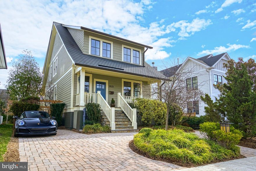 Fantastic opportunity to live in the heart of Clarendon. Impeccably & meticulouslly maintained Mickey Simpson Barton model featuring  approx. 3,600 square ft , 4 bedrooms &  3.5 baths. This home is filled with natural light, elegant hardwood floors on two levels, and high ceilings throughout. The gourmet kitchen is equipped with solid cherry cabinets, Subzero, Wolf & ASKO appliances. The French doors open from the family room onto the covered Porch overlooking the beautifully landscaped backyard. The lower level features tile flooring, a gas fireplace & a walk-out basement. The 4th bedroom and expansive laundry room is also located on this level. Every closet/storage space has built-ins to maximize storage and organization. This home comes equipped with 2 zones/HVACs, a whole house generator, copper gutters, 3M UV protection film on all windows, impeccably landscaped front and back yard (fully fenced) with an irrigation system, and a paver driveway, including a Bosch electric car charger and parking for two cars. Convenient for shopping, dining, and nightlife. Minutes from the metro, Market Common & everything Clarendon offers.  Arlington Science Focus ES, Dorothy Hamm MS, Washington Liberty HS.