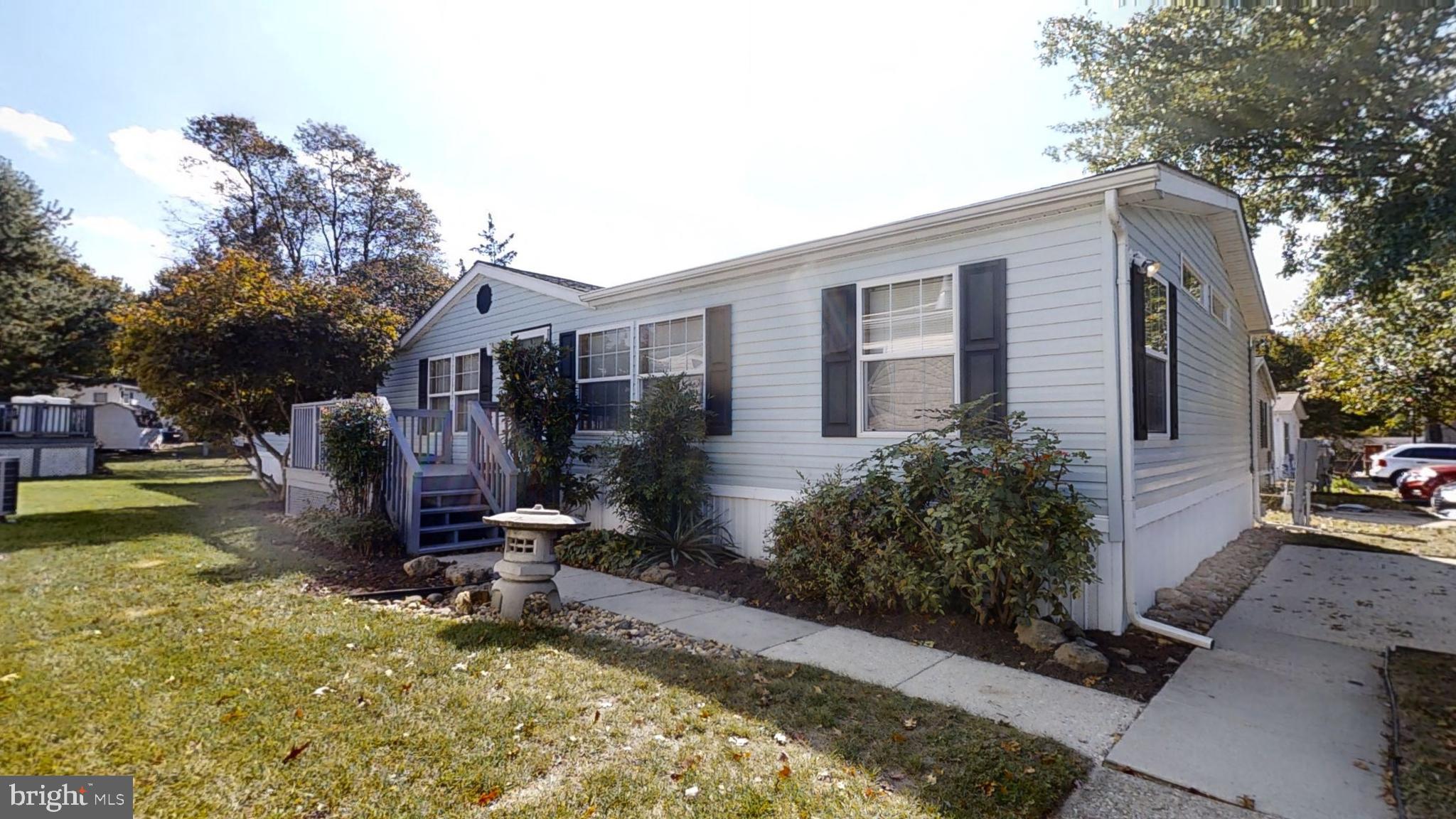 This spacious home is located just 25 minutes from both Annapolis and Baltimore City. It has 4 bedrooms including a master with a bath and walk-in closet. It's in a wonderful community with welcoming neighbors in a quiet area. This property is part of a mobile home community and has a monthly ground rent of $798.