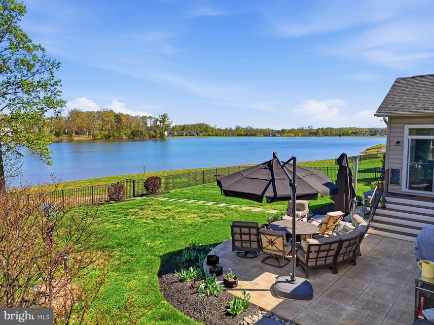 Luxury Lakefront Living in Brookside – A Multigenerational Dream Home

Welcome to an exceptional lakefront retreat located in the prestigious Brookside community, where luxury, nature, and thoughtful design come together effortlessly. Surrounded by scenic views and miles of paved walking trails, this home offers a lifestyle filled with tranquility, recreation, and refined comfort.

This impressive five-bedroom residence is thoughtfully designed for both everyday living and multigenerational flexibility. The home includes three spacious ensuite bedrooms, an additional hall bath, and a versatile layout with two bedrooms on the upper level, two on the main level, and a private lower-level suite.

At the heart of the home is a beautifully reimagined chef’s kitchen, designed with both style and functionality in mind. Equipped with a premium BlueStar stove and oven, Miele coffee maker, and speed oven, the space is perfect for culinary enthusiasts. A striking oversized island with a waterfall edge serves as a central gathering space, seamlessly flowing into a comfortable seating area ideal for entertaining or casual dining.

The sunroom is a standout feature, showcasing panoramic lake views and a front-row seat to nature. From soaring eagles to graceful herons and flocks of geese, the ever-changing wildlife can be enjoyed from nearly every rear-facing window—bringing the outdoors in with peaceful, picturesque scenery year-round.

The fully finished basement expands the living space even further, featuring a private movie theater, a fully equipped gym, and a spacious living area with its own kitchen complete with a refrigerator, dishwasher, and granite countertops. This level is ideal for extended family, guests, or independent living arrangements.

Whether you're casting a line in the lake, enjoying birdwatching from the sunroom, or walking along Brookside’s extensive trail system, this home offers a rare opportunity to experience luxury living in harmony with nature.

Experience lakefront living at its finest—where every detail has been carefully curated for comfort, beauty, and connection.