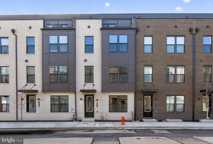 TOTAL INCENTIVE HAS BEEN APPLIED TO THE PRICE ** WITH USE OF APPROVED LENDER AND TITLE!
Welcome to the Rockland, an open-concept luxury townhome with modern finishes and an urban aesthetic! Enter the home through the main entryway or the rear load 2-car garage, both leading into a spacious Study room and convenient full bathroom. Ascending to the second level, you will discover the main living space comprised of a sunlit family room. At the center you find an amazing chef worthy gourmet kitchen with high end appliances with an oversized quartz island. The dining room complete with a sliding glass door and rear deck access. When it's time to relax, retreat to the primary suite, a private getaway that can be found on the third level. Take advantage of the the large walk-in closets and spa-like bathroom which features dual vanity sinks and an upgraded shower. The laundry room is also located on the third level, conveniently accessible from the primary suite and secondary bedrooms. Enjoy stunning views from the fourth level's loft deck, a private outdoor living area perfect for entertaining family, friends, and loved ones. Flexible by design, the fourth level offers a 4th bedroom and full bathroom plus wet bar with spacious rec room. ***THIS PROPERTY MAY QUALIFY FOR THE BROWNFIELD TAX CREDIT. WHICH COULD RESULT IN UP TO A 70% REDUCTION IN ANNUAL CITY PROPERTY TAXES FOR TEN YEARS***  See sales consultant for more information. =