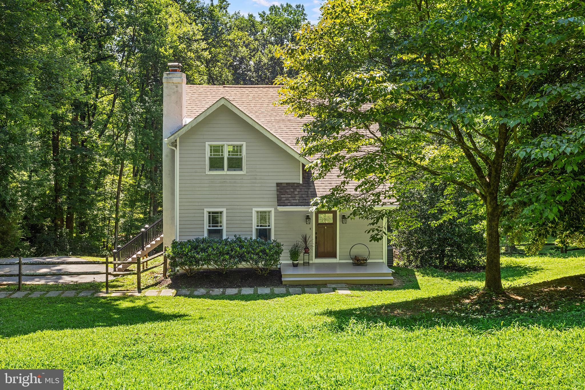 Nestled on an absolutely beautiful & peaceful 2.1 acre lot, discover 39 Elstone Drive in Glen Mills. From the moment you arrive at this incredibly special property, you will notice the serene natural setting where you can experience the beauty of each seasonal change. The front door opens to a fabulous blend of contemporary and rustic charm throughout the home. From the wooden vaulted ceiling, to the beautiful hardwood floors and quaint stone fireplace, as well as the incredible scenic views from every window, you will feel like you are miles away from everything, yet you are just minutes to shopping, restaurants and more! From the Living Room, continue to the spacious dining area which is customized with wood ceiling beam architectural accents. The dining area overlooks the updated kitchen which offers ample cabinetry, casual breakfast bar and pantry. Sliding doors off the dining area flood the home with natural light and open to a new, maintenance-free deck which provides the perfect spot for relaxing or entertaining. Stairs from the deck lead to the private rear yard, shed and fire pit area. On the upper level you will find a spacious Primary Bedroom with an updated ensuite bathroom and a large walk-in closet as well as a secondary bedroom or office space. Continue down to the lower-level, which also has it's own separate entrance, to find a large Family Room with luxury vinyl flooring, a third bedroom, an updated full bathroom, plus a convenient laundry area and large storage closets. This home offers all the style, charm, privacy and convenience you want, plus it's located in the coveted West Chester Area School District! This could be the amazing property for which you have been searching! Book your showing appointment today!