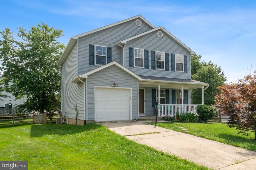 Welcome to this home that sits on a tranquil cul-de-sac that offers the perfect blend of comfort, convenience and peaceful living. You will enjoy the covered front porch as you step into this home  with abundance of natural light. The open concept layout seamlessly connects the living, dining, kitchen and family room areas creating an ideal space for entertaining family and friends. From the family room you can easily access the rear deck, where you can relax and enjoy your morning coffee or host an unforgettable gathering, all while taking in the yard and the surrounding split rail fence. Upstairs you'll find three bedrooms for retreating at the end of a long day. The primary bedroom features an ensuite bathroom, providing a private oasis where you can unwind and rejuvenate. The two additional bedrooms share a full bathroom, ensuring everyone's comfort and convenience. One of the highlights of this home is the finished basement which offers additional living space and a separate entrance. You will appreciate  3 spacious levels totaling over 2,600 square feet of living space. This sought after Wakefield neighborhood has street lights, trails, community pool, playground, tennis courts, large fields for soccer and a community center that hosts neighborhood events.  Close to shopping, restaurants, and major arteries.