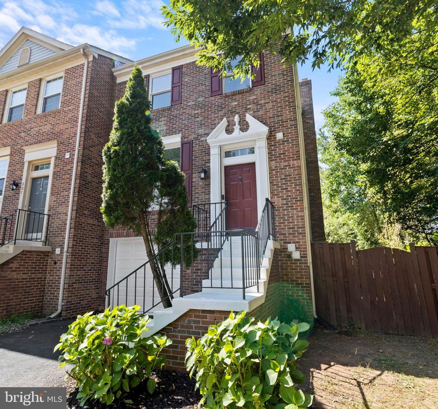 New To The Market !   Offers, if any are due, Tuesday, July 18th at 10:00 AM Beautifully updated end unit, garage townhome in the desirable Amberfield Community.  This three bedroom, three and one half bath home is sure to please. Featuring a large family room and open concept kitchen and dining area, this home has much to offer.  The renovated kitchen with stone backsplash, granite counter tops and stainless steel appliances emphasize the clean lines of gourmet kitchens.  French doors from the dining area open to the generous deck which over looks the fenced back yard.  The upper level primary suite complete with walk-in closet, dressing area, and updated bath is a perfect retreat.  Two secondary bedrooms with built-in closets and an updated hall bath round out this level.
The lower walkout level adds additional living area with another full bath, family room with brick fireplace and built-in bookcases as well as access to the lower level deck and yard  is a bonus.  The garage is accessible from this level. *New Driveway '23  *Trex Deck '22 *  Hot Water Heater '21 *