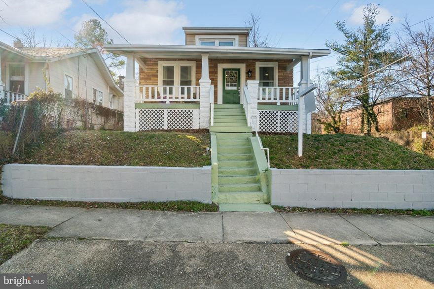 <<< Motivated Seller!!! Grant for first time buyers up to $15,000. Call Presidential Bank at (301) 641-3889 for details. Seller will contribute $5,000 towards closing cost>>>. Absolutely gorgeous, beautiful move in ready single family home. This 3 bedroom, 1.5 bathroom bungalow home is located in the well sought out Historic District of Mount Rainier. The property is a large corner lot with a huge backyard for entertaining and sits on a hill overlooking the other homes in it's immediate surroundings. The elegant features of this home boasts a front porch with three columns and the front with stone facing. Inside you will find hardwood flooring that flows throughout the house. The living and dining rooms have large windows that allows natural light in to brighten the entire home during the day and recessed lighting to give you that controlled lighting at night. The dining room has chair rails that defines the dining room from the rest of the house. The bathroom has a 6'-0" x 3'-0" tiled shower with a fixed frameless shower glass and shower glass door. LED light is hung above the vanity and a recessed light is added lighting for the shower. The powder room with it's LED lighting is conveniently located for guests. The kitchen is totally renovated with quartz countertops and custom made cupboards and cabinets. It is equipped with stainless steel appliances, stainless steel sink and faucets, and a front load washer and dryer. All appliances are brand new. The Attic has a lot of additional space for storage. This home is close to shops and restaurants for dining out and just to go walking in the Historic District. It is also only a few blocks from the MD/DC Line. Don't miss out on this one, so bring your buyers. They will love it!!!!
