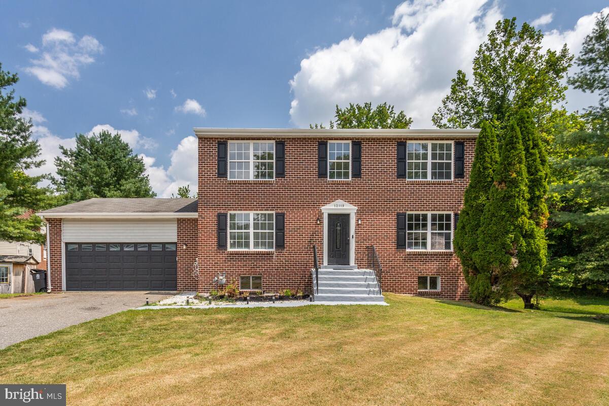 This brick single family home has been beautifully maintained and upgraded throughout! You'll love the cool grey scheme including upgraded floors, fireplace, stainless steel appliances, granite countertops, and more. The first level has a spacious living room, dining area, bedroom and kitchen. Venture upstairs to find the bedrooms with fresh carpet and hall bath and the master has it's own bathroom as well with standing shower and soak-in tub. The basement is perfect for guest with another bedroom and the ideal entertainment space including a bar and walkout leading to the backyard. You can't find a better yard when it comes to usability with ample space and a deck to relax on. Don't hesitate to view this today!