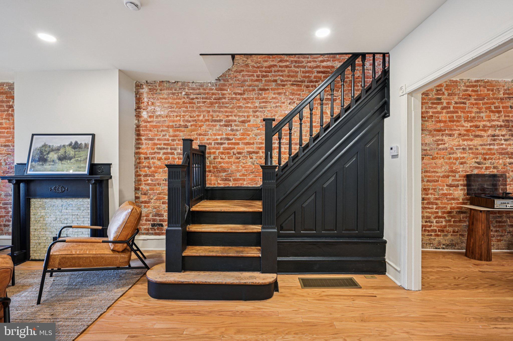 West Philadelphia hidden gem
Where timeless charm meets thoughtful modern living. Welcome to your new home, where original character blends effortlessly with carefully curated upgrades. This stunning residence is filled with bright, welcoming tones, smart custom storage, an open, spacious layout that truly maximizes every square foot. Step inside through the inviting vestibule, adorned with terra cotta tile floors and elegant wisteria garden wallpaper. As you enter the living room, you will immediately appreciate the soaring ceilings, oversized windows, and beautifully maintained hardwood floors that run throughout the home. An original decorative fireplace and striking stained-glass windows add warmth and character, while flooding the space with natural light. An extra-wide opening flows seamlessly into a generous dining area, ideal for gatherings. The chef-inspired kitchen is a true showstopper, featuring Frigidaire stainless steel appliances, sleek gold hardware, a designer faucet, and a gold pot filler for that touch of luxury. Just off the kitchen is a stylish powder room, and beyond that, a private backyard perfect for outdoor entertaining or peaceful relaxation. Upstairs, the original staircase leads to four spacious bedrooms. The primary suite offers a large closet and abundant storage, ideal for modern living. The fully finished basement opens up a world of possibilities think home office, game room, media lounge, or creative studio. It also includes a full bathroom, laundry area, and your very own wine rack. Designed to offer both tranquility and style, the home features elegant black and gold fixtures throughout, combining sophistication with easy maintenance. Located just moments from Baltimore Avenue, University City, and a short commute to Center City, this beautifully renovated home is perfect for families, professionals, and anyone seeking the best of city living. Don’t miss your chance schedule your private tour today!
Disclosure: Owner is a licensed Pennsylvania Realtor.