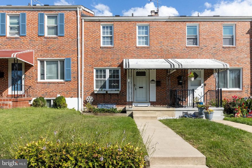 SAT OPEN HOUSE CANCELED,  the house is under contract.    Come visit this charming Parkville house, newly painted and move-in ready!  The house has original hardwood floors on the main level and new carpet upstairs.   The  sunroom in back of the house, with large windows,  offers wonderful extra space for an office, den, workshop, or exercise.  There is a brand new patio in the back that is fully fenced, but could be easily converted to a parking pad if needed.  Downstairs is a finished area with a bar and utility area with nice storage space.   The full bath in the basement was installed in 2019.   Numerous updates include a new roof (including sunroom)  in 2020;  central air condition replaced in 2018;   new kitchen counters;  new patio and fence (2022); and new paint and carpet.   The location is super convenient, close to shopping, schools, parks, 695,  but in a lovely walkable neighborhood with sidewalks and mature landscaping.