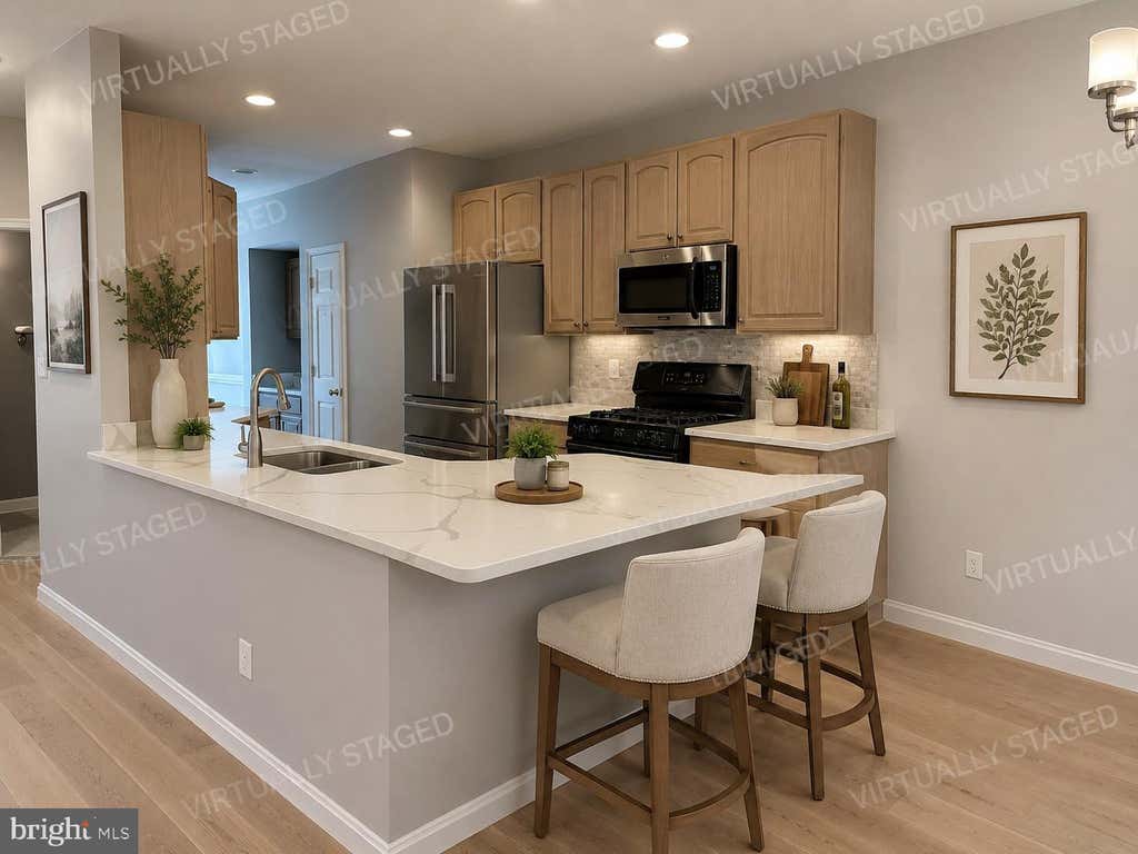 Photo of 20381 Fallsway Terrace, STERLING, VA 20165 (MLS # VALO2131218)