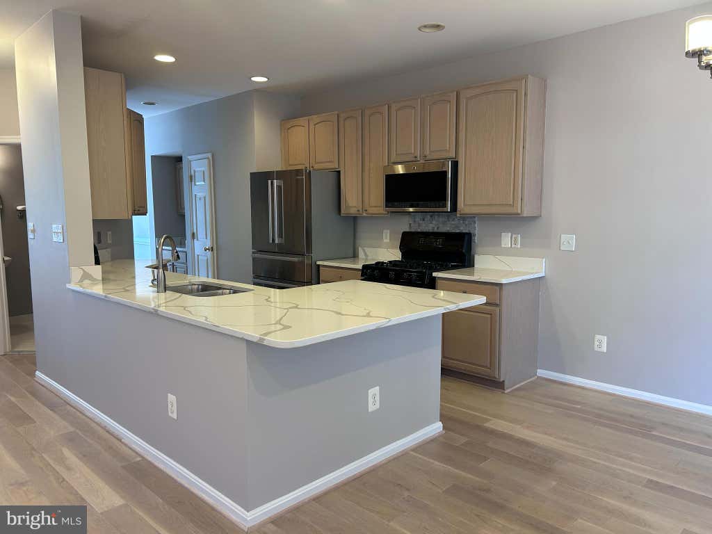 Photo of 20381 Fallsway Terrace, STERLING, VA 20165 (MLS # VALO2131218)