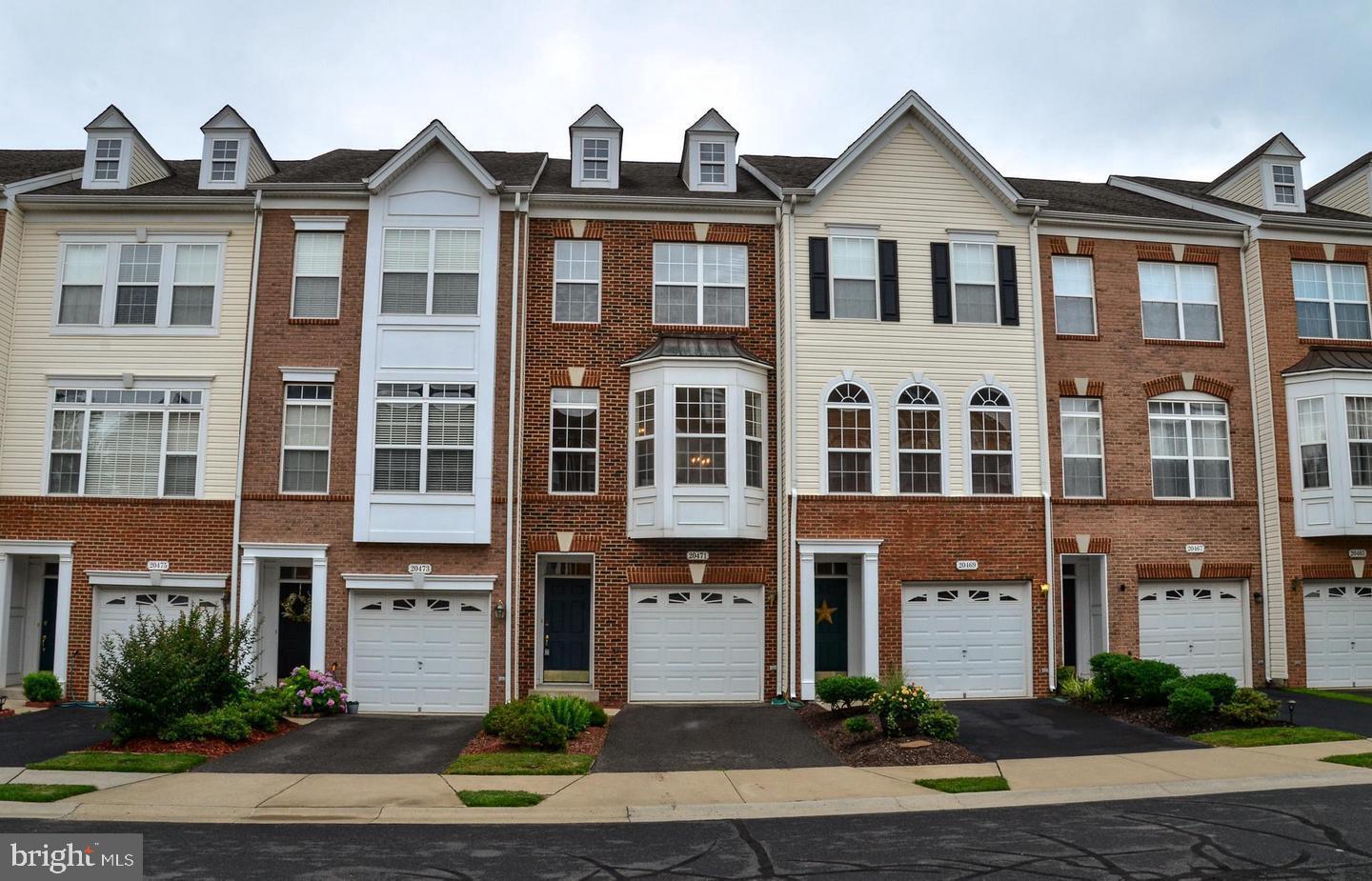 Luxury Living! A Belmont Country Club beauty. Image yourself in this pristine brick front garage townhome. All the upgrades you expect. Hardwoods, fresh paint and new carpet. This impeccable brick front garage townhome is approximately 1700 s/f. Enjoy 2 large primary suites with ensuite luxury baths. The primary suites and ensuite baths are perfect for ultimate comfort. The Gourmet Eat- In Kitchen features lovely hardwood floors, 42" cherry cabs and a center island. There's a great new deck off the kitchen to relax after a hectic day or simply enjoying the peaceful surroundings. The Large living room features a bay window. This beautiful townhome has a walk out lower level with a large bonus room and full bath. A great space for an office, in-law-suite or rec-room. Located at the end of a cul-de-sac there's no bustling traffic to deal with. High speed internet and basic cable are included in the monthly rental. Close to restaurants ,whole foods and easy access to hop on the W&OD trail. Nothing to do but move in. A great community to call home!