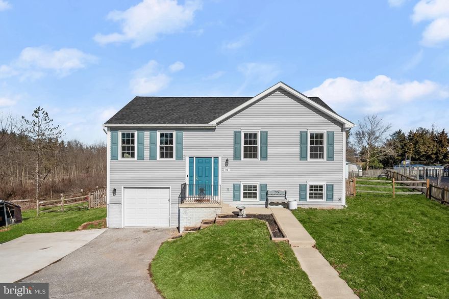 Welcome to 79 Crimson Avenue, a beautiful split foyer home tucked away in the welcoming community of Meadowbrook. As you enter, you are greeted by a spacious living room that sets the stage for entertaining family and friends. The open and inviting atmosphere makes this room the heart of the home, creating a perfect space for gatherings and relaxation. The eat-in kitchen is a chef's delight, featuring sleek stainless steel appliances, ample cabinetry, a convenient center island, and a casual dining area with access to the deck and backyard. The primary bedroom on the main level is a retreat in itself, boasting a renovated en-suite full bath for added comfort and luxury. Two additional bedrooms and another renovated full bath complete the main level, providing ample space for family and guests. The lower level of this home offers a versatile family room, perfect for movie nights or game days. The laundry facilities are conveniently located on this level, along with access to the garage and plenty of storage space, ensuring functionality and organization. Outside, the deck, patio, and backyard offer a private oasis for enjoying outdoor activities, barbecues, or simply soaking in the natural surroundings.  Recent Updates include, Hot Water Heater: Replaced in 2019 for improved efficiency and reliability, HVAC System: Upgraded in 2020 to ensure optimal heating and cooling throughout the property, Appliances: Updated in 2021 with new, modern appliances for enhanced functionality and aesthetic appeal, Bathrooms: Renovated in 2022, Roof: Replaced in 2022 to provide durable protection and extend the lifespan of the property, Windows: Upgraded in 2023 for improved energy efficiency and enhanced curb appeal, Floors: Installed new LVP flooring.  Community Amenities: Enjoy a vast variety of shopping, dining, and entertainment options in the towns of Taneytown, Westminster, Hampstead, and Manchester. Outdoor recreation awaits you at Taneytown Memorial Park, Taneytown Duck Pond, Westminster National Golf Course, and more. Convenient commuter routes including MD-140, MD-97, and MD-194. Allow quick and easy access to Pennsylvania.