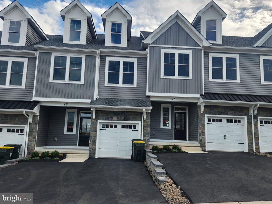 Gorgeous new 3BR, 2.5 BA townhome in High Point at New Britain. Covered front porch entry leads to an open concept layout on 1st floor with beautiful white oak wide-plank hardwood floors. Gourmet Kitchen with upgraded cabinetry, center island with breakfast bar & top of the line appliances including a down-draft gas range &under-counter microwave. The Kitchen overlooks the Dining area & Family room with gas fireplace & sliding glass door leading to Trex deck. Turned staircase leads to the 2nd level with plush wall-to-wall carpet throughout. Primary BR with walk-in closet & full Bath with double vanity, ceramic tile floor & glass door walk-in shower with tiled walls. 2 additional large bedrooms, full hall bath with ceramic tile floor, tub/shower combination with tiled walls plus 2nd floor Laundry room complete the 2nd level. Full, Finished Basement. 1 car, attached Garage. Gas heat, central air.