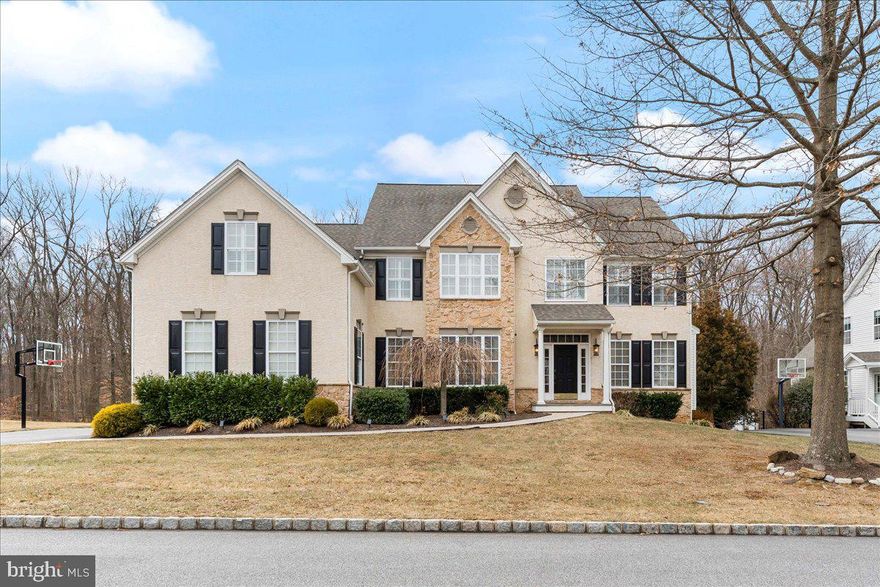*** Offer deadline - all offers due by Sunday March 2nd at 9 PM *** Exceptional is an understatement for this stunning one of a kind lovingly updated and upgraded Hunters Creek Colonial home nestled on a premium lot backing up to lovely woods, situated in the heart of Garnet Valley and top rated Garnet Valley school district. A beautiful grand stone facade and main front entrance walks into a breathtaking cathedral foyer entrance where you're greeted by endless upgrades & top end finishes including endless custom millwork, custom stonework, beautiful wood floors that flow throughout a lovely open floor plan, built in's, 10' ceilings and much, much more. Only available due to downsizing, this fabulous upgraded and lovingly maintained home has 4 spacious bedrooms on the upper level. The luxurious master suite is well appointed and spacious; featuring multiple walk in closets, a large sitting room,  a fabulous tiled master bath with with a walk in tiled shower, his & her double vanity and more. For optimum convenience the laundry is situated adjacent to the master suite. The main level living area features a spacious family room with a cozy gas fireplace that is adjacent to the gourmet kitchen with beautiful upgraded slow close cabinetry, an oversized center island, vaulted ceiling, a large pantry, custom millwork and custom quartz stone accent wall and backsplash, stainless appliances including double ovens, microwave, dishwasher, cooktop and refrigerator, lovely counter tops, a beautiful sunny morning room featuring a vaulted ceiling that walks out to an expanded and partially covered rear wrap around deck looking out over the large private rear yard backing to trees and nature abounds. Also adjacent to the kitchen is a grand formal dining room and living room and there is a spacious private office with custom built in's looking out over the beautiful backyard, a conveniently situated half bath and a mudroom with a custom bench and shoe / coat organizer leading to the three bay garage with room for all your cars and toys. There is even a custom sport court and basketball hoop outside for the sports enthusiast. The partially finished lower level adds an additional approximate 1,100 square feet of expanded living space with a great room, fitness room and lots of storage space.  There is roughed in plumbing should you wish to add an additional bathroom.  The seller has expended hundreds of thousands of dollars on multiple upgrades and updates over the past years; a detailed list is available and attached to the MLS listing.  Centrally located to the Garnet Valley School campus, the Concord Township Park, Walking & Running Trails, Dog Parks, the Rachel Kohl Library, the Brandywine Youth Club sports fields and field-house, dance studios, Darlington Arts Center & all commuting routes to corporate centers, Delaware tax free shopping, airports, Philadelphia, Wilmington, Media, West Chester & more. This exceptional well maintained home is a must see and is truly move in ready. Showings begin Friday February 28th and an open house is scheduled for Sunday March 2nd from 12 PM to 4 PM. Schedule a tour of this spectacular home today or come to the open house before its too late !!