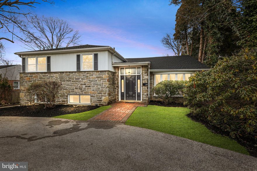 Perfectly Located Fully Renovated Beautiful Split Level In a Great Location In Lower Merion Township! As you approach the house you will be immediately taken by the Beautifully Landscaped Front Yard.  Circular Driveway with pavered entryway.  As you enter the front door you will be amazed at all of the space this home has to offer.  The beautiful refinished hardwood floors run throughout the living, dining and all 4 bedrooms.  The sunken living room has Vaulted Ceilings, large windows that will brighten your day, and recessed lights.  Head into the eat-in kitchen which features upgraded granite counters, brand new stainless steel appliances which includes new cooctop, oven, refridgerator, dishwasher and microwave. The kitchen opens to the huge dining area perfect for holiday gatherings and family celebrations.  Thru the dining room is the incredible patio which features a slate floor and a  private backyard with an inground swiming pool. Head upstairs to the sleeping quarters.  The Master Bedroom is huge with a walk in closet, private brand new en-suite bathroom, ceiling fan and recessed lights.  The 3 other bedrooms are generously sized and all feature new ceiling fans.  The hall bathroom has been tastefully renovated with art deco inspired finishes.  Head to the lower level of the home for the ultimate entertaining space.  You will be immediately smitten by the large bar designed with reclaimed barn wood, granite countertop, bar refrigerator and custom sink.  Beyond the bar is the cozy family room with wood burning stone fireplace and large picture windows.  Head down to the unfinished basement for even more space ready for a craft room, pool table or whatever you can dream off.  The lower level also feature a mud room, laundry area and a fifth bedroom.  House has most of the windows replaced, new roof, updated electric, updated HVAC System, new paint and fixtures throughout and is move in ready.  Schedule Your Appointment Today!