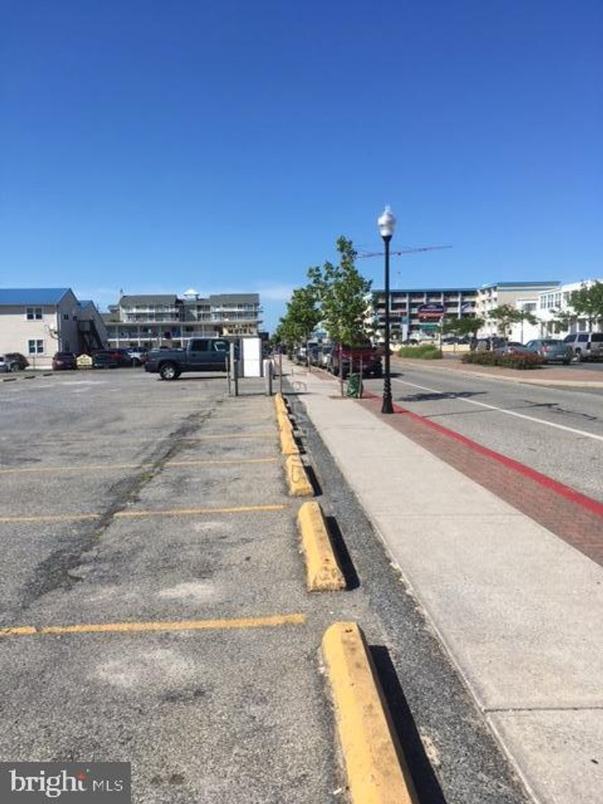 3 vacant lots on Baltimore Avenue facing the ocean. Zoned for 17 residential units plus professional office space.