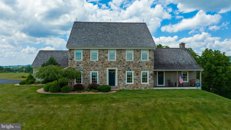 Gorgeous colonial style home with over 3,800 square feet set on a sprawling 3.2 acre property that has
scenic farmland and wooded views from all angles, as well as the Conestoga Creek that runs on the land.
Filled with custom features, hardwood flooring and crown molding throughout, you will fall in love with
the house as soon as you step inside. Gourmet eat-in kitchen has large island with granite counter and
wine cooler, stainless steel Viking appliances, tons of wood cabinets including built-in desk, and
beautiful custom tile backsplash that incorporates a portrait of the property. Spacious family room with
wood burning fireplace opens from the kitchen and provides lots of natural lighting from the glass doors
that lead to the patio, as well as the recessed lighting and large 9-foot ceiling with exposed wood beams.
Home offers 5 sizeable bedrooms including an entry level primary suite as well as additional owner’s
suite on the second floor. The exterior of the home is equally stunning with multiple covered porches,
brick patio, and gazebo style shed. Ample storage space from the 2-car garage and large unfinished
basement.