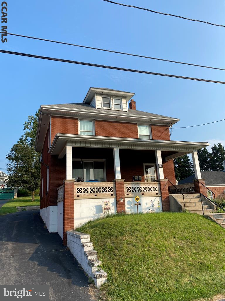 Make this your home or rental! Perfect for the growing or extended family with two kitchens. Well maintained brick home currently with one upper and one lower apartment rentals, beautiful wood throughout, public water and sewer, central a.c., long-term tenants, commercially zoned, 1799 sq. ft., carport and off street parking in rear, Additional parking may be added at rear of building for business opportunity. Showings must be scheduled in advance, evenings and weekends only, OPEN HOUSE 1-3 p.m. Sunday, June 5.