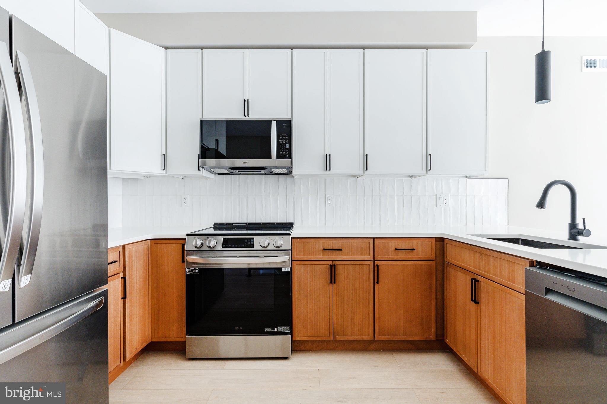 Welcome to 2048 N 3rd Street, a newly constructed DUPLEX boasting 6 bedrooms and 4 bathrooms (3/2 in each unit), a 10 YEAR TAX ABATEMENT and 1 YEAR BUILDERS WARRANTY! Take advantage of everything that comes with this location which includes the redesign of the American Street Corridor and walking distance to the Berks L Stop taking you into center city, LMNO, Kalaya, Goldie, Suraya, Evil Genius Beer Company, Human Robot Brewing Company, Stateside Vodka, The Ground Coffee, Plants, and Gifts, Luna Cafe, Cousins Supermarket, and Norris Square! With projected income of $4400/month or $52,800/year this cash cow will not last long! Qualify for a grant of up to $17,500 in free grant money, making your homeownership dreams a reality with just 3% down and low PMI for owner occupied buyers! (Income restrictions apply)
Step into this 4-story, duplex to explore its open-plan living space and modern kitchen, featuring exquisite quartz countertops with a waterfall edge, two-toned shaker cabinets, a modern subway-tiled backsplash, and high-end stainless steel appliances, including a microwave, slide in range, dishwasher, and a spacious fridge. Each bedroom is equipped with ample closet space, and the 2 full bathrooms showcase beautifully tiled showers with glass doors and large shower heads. The building is equipped with security cameras and an alarm system.
Unit 1 (1st floor and basement) offers a delightful backyard, providing the perfect escape with a projected monthly rent of $2400, while Unit 2 (2nd and 3rd floor) boasts a private rooftop deck with stunning views of the Philadelphia city center and projected monthly rent of $2,000 for a total of $4,400/month or $52,800.
Don't miss out on this exceptional opportunity to merge luxury living with financial advantages. Reach out to the listing agent today for more details and to schedule a viewing.