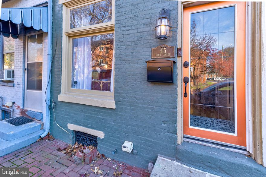 Say hello to 415 Herr St, located in the Midtown neighborhood. This stylish and large 2-bedroom, 1-full bathroom has tons of character throughout. The first floor has an open concept living room which flows into the dining room, with a great exposed brick wall. The kitchen comes complete with all of the stainless steel appliances. Upstairs you'll enjoy an open sitting area with a balcony that overlooks the lower level along with a guest bedroom. There is also a full bathroom which includes a washer and dryer, for ease of use. Upstairs on the third floor, you will find a large primary bedroom suite spanning the entire floor with a cool vanity. Enjoy a large rear fenced in back yard and a private parking space. This location is steps away from the Capitol building  and historic Broad St Market. You will also enjoy local shopping and dining around the Susquehanna River front, as well as close proximity to the Amtrak station. Included in the sale is a nearby lot, approx 668 sqft, which can accommodate parking for two additional cars.