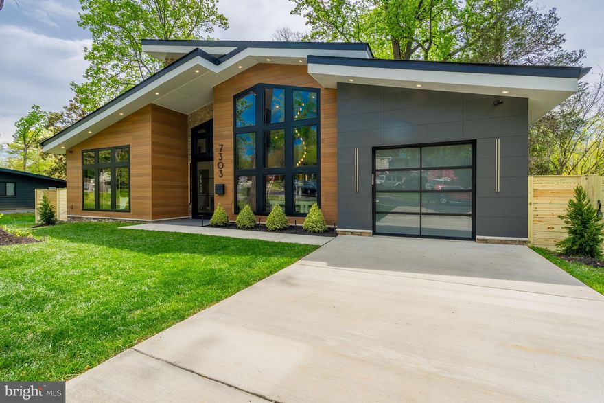 The wait is almost over!!! This is an exceptional luxury home crafted by ACG Custom Homes. As you enter through the impressive 5-foot pivot door, you will be captivated by the vaulted ceiling adorned with custom beams and lighting. The home boasts high-quality features such as MARVIN windows, Monogram appliances, California hardwood, modern cabinets, and premium finishes. Experience continuous comfort with the innovative hydronically heated floors throughout the lower two levels and master suite, accompanied by two fireplaces, a furnace, AC, and a high velocity heat pump system. The open floor plan of this home showcases gleaming hardwood floors that seamlessly connect the kitchen, dining area, and family room. If you desire a main level master bedroom, this home has it. The upper level master bedroom offers a unique touch with a custom LED light and wood sticks panel, skylights, a chandelier, and ample space. Prepare to be amazed by the jaw-dropping master bathroom, featuring a custom ombre mosaic covering the entire 9 feet shower, his and hers faucets and benches. The master bath also includes a TV, heated towel rack, floating vanities with lights, custom mirrors, and a stunning floating tub. The walk-in closet is reminiscent of a high-end boutique, complete with custom shelves and storage features. The lower level boasts a striking gas fireplace, a bar with ample seating and storage for entertaining. If you desire a game room, there is plenty of space to create one here. The lower level bedroom and bathroom are perfect for accommodating additional family members or guests. This home is carefully curated by the ACG Custom Homes team. Each room in this home offers a truly remarkable experience. The yard is fully fenced in and adorned with mature trees. Builder warranty included.