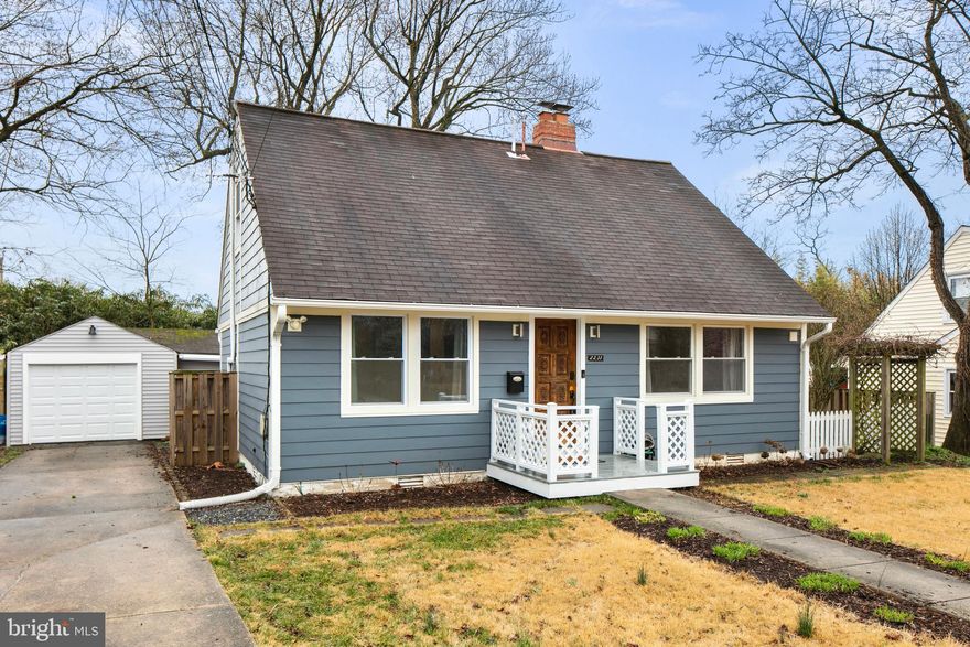 Welcome home to this charming and beautifully updated 3 bedroom, 2 full bath Cape Cod in North Woodside!  A trellis with grape vines, white picket fence, and front path lined with daylilies create a storybook curb appeal.  As you enter the home, you're greeted by an open-concept main level adorned with a brick hearth fireplace.  The immaculate kitchen features quartz countertops, an apron-front sink, and statement range hood.  A sliding door leads to the fully fenced backyard with fire pit, ample patio space, and private access to the detached garage and studio.  Back inside, the spacious main-level bedroom is a peaceful retreat with a large walk-in closet and a spa-like ensuite bath.  Upstairs, two bedrooms brimming with character await, along with a second renovated bathroom and a private laundry area.  Adding to this home's allure is a totally updated garage with a new garage door and automatic opener, new siding, gutters, a 240-volt outlet for EV charging, and 'the studio'— an expertly transformed adjoining flex space with insulation and power, perfect for an office, gym, or art space.  Other recent upgrades include a new HVAC system and water heater.   Enjoy a yard bursting with hydrangeas in the months ahead.  Located on a quiet tree-lined street convenient to downtown Silver Spring, this home offers easy access to shopping, dining, and major commuting routes.  This adorable home truly offers the best of both worlds – suburban tranquility with urban convenience!