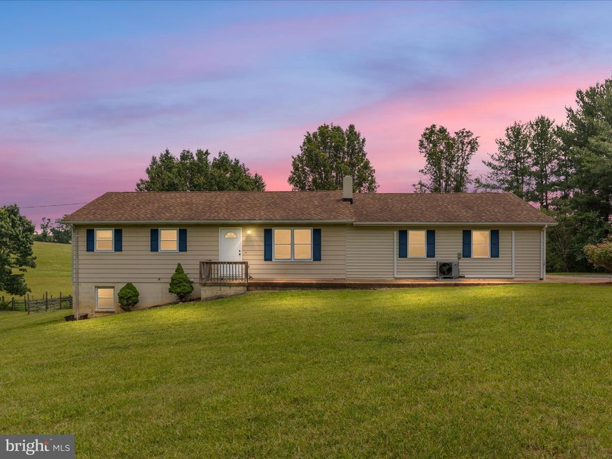 See Video and iGuide for an interactive tour of the property. 

**Charming 4-Bed, 3-Bath Ranch on 2.4 Acres – Horse-Ready with Mountain Views**

Enjoy the best of country living in this spacious 4-bedroom, 3-bath ranch-style home, situated on 2.4 peaceful acres with stunning mountain views and ample room to spread out. Featuring a traditional split-bedroom floor plan for added privacy, this home has fresh paint throughout, new laminate flooring in the guest bedrooms, and brand-new carpet in the living room and remaining bedrooms. One-level living makes day-to-day life convenient, with laundry hookups on both the main level and in the basement.

The full walk-out basement offers abundant space, ready to be finished to suit your needs—whether it’s a workshop, rec room, or guest suite. The property also features a 1-car garage and ample additional parking for guests, trailers, or RVs.

Outside, you’ll find everything you need for your hobby farm or equestrian lifestyle: a large field fenced for horses, cross-fencing with a smaller pasture in the back, and a barn/shed ideal for feed, tack, or storage. There’s even space for chickens! Whether you're looking to keep animals, garden, or enjoy peace and quiet, this home delivers space, versatility, and privacy in a beautiful rural setting.

New well pump in 2023; septic pumped in 2022; roof inspected in 2024; brand new HVAC just added in 2025 and two mini splits!  Seller offering a Home warranty at cost not to exceed $600 with acceptable offer - provided by home warranty.   Ramp to front entrance