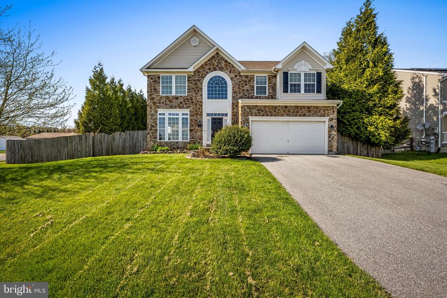 Welcome home to this exquisite four bedroom, two and a half bath residence in the highly sought-after Manchester Farms community! A light-filled two-story foyer creates a stunning first impression, leading into elegant formal living and dining rooms—perfect for entertaining.  The kitchen is a chef's delight, featuring stainless steel appliances, a spacious pantry, a charming corner sink, ample counter space, open shelving, and a breakfast area. The adjoining family room offers a warm, inviting space for everyday living, while the sun-filled morning room just off the kitchen is ideal for enjoying your coffee or relaxing with a good book.  Upstairs, you’ll find four generously sized bedrooms and two full baths, along with the convenience of an upper-level laundry closet. The primary suite is a private retreat, boasting cathedral ceilings, a large walk-in closet, and an en-suite bath complete with a soaking tub, double sinks, and a separate shower. The unfinished walk-out basement offers incredible potential, already equipped with a workbench and rough-in for a future bathroom—ready for your personal touch. Step outside to a private backyard oasis featuring a Trex deck with a built-in bench—perfect for grilling, entertaining, or simply unwinding.  Ideally located for commuters, this home is just minutes from major routes, shopping, dining, and parks.  This Hampton floor plan offers the perfect blend of luxury, comfort, and functionality. Don’t miss your opportunity to make this exceptional home yours!