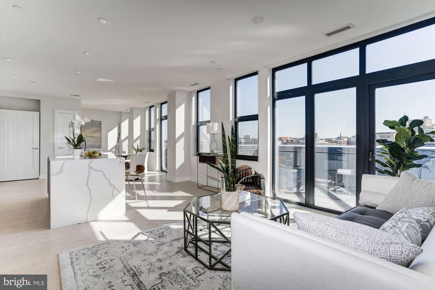 This one-of-a-kind 2BR/2BA, 2 powder penthouse residence features private elevator access, an open floor-plan and designer finishes throughout. The main level offers Poggenpohl kitchen with 'waterfall' island and Thermador Bosch panelized and stainless-steel appliances; two master suites with baths  en-suite  and three private balconies. The full upper level entertaining space offers private roof deck equipped with a gas-grilling kitchen and direct Washington Monument views. One garage parking space, front-desk service and a premier Logan Circle location complete this offering!