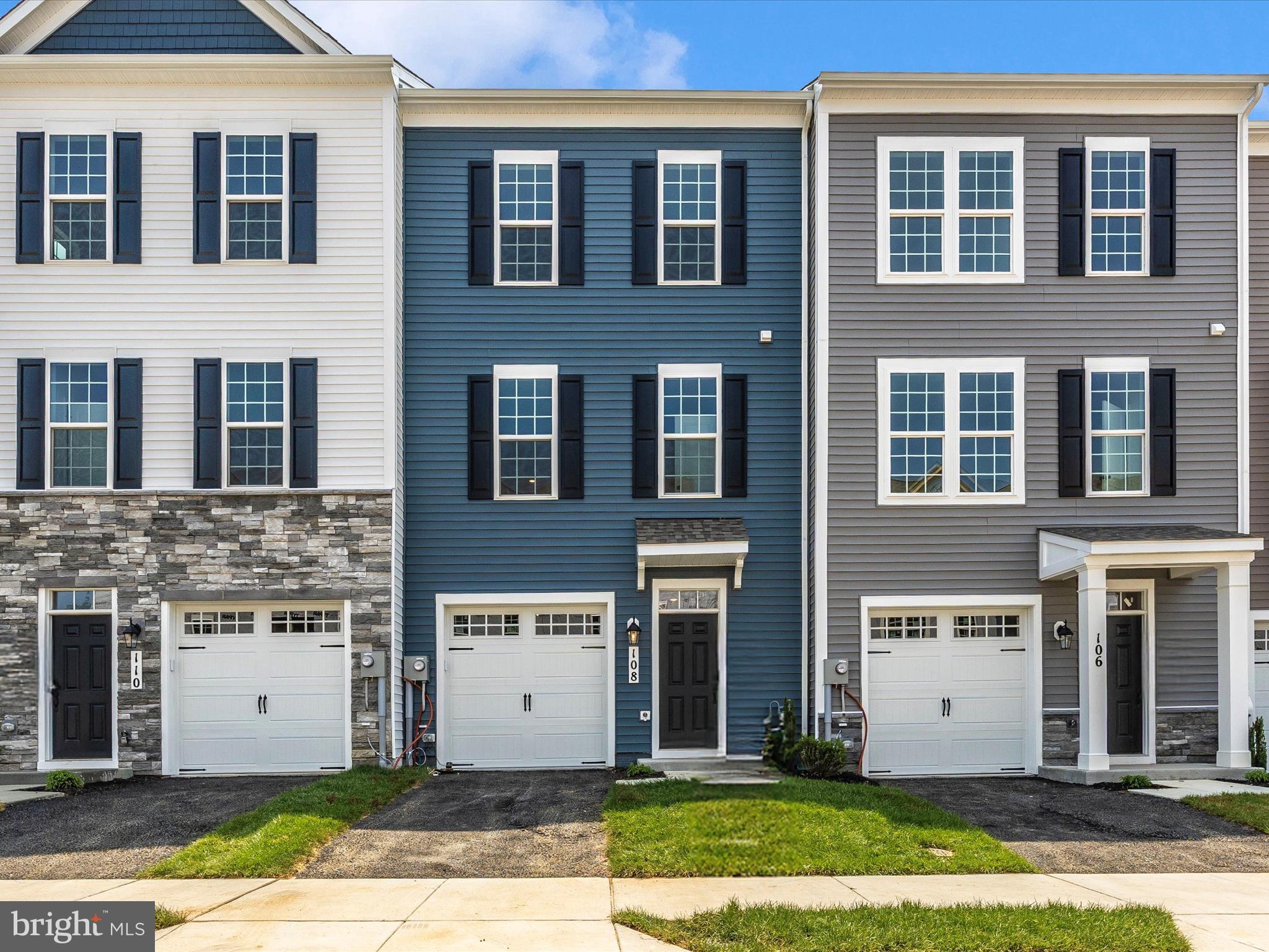 **OFFERING $15,000 IN CLOSING COST ASSISTANCE WITH USE OF PREFERRED LENDER AND TITLE**MOVE-IN READY** Welcome home to Spring Bank by PDR Homes! This walkable community is conveniently located near the Clemson Corner and Market Square shopping centers, which feature Wegmans, Lowe's, OneLife Fitness, Marshalls, HomeGoods, and a variety of dining options. Discover the exquisite Auburn II, a beautifully designed luxury townhome that offers three spacious finished levels and an attached 1-car garage. With 4 bedrooms and 3.5 bathrooms, this townhome showcases an open modern floorplan and elegant designer finishes. The kitchen is a stunning focal point, featuring a generous center island, a bright sunroom, stunning quartz countertops, a stylish subway tile backsplash, and stainless steel appliances. You'll enjoy the additional outdoor living space provided by a 12 x 18 composite deck off the morning room. The upper level includes an expansive owner's suite with a walk-in closet and an upscale bathroom with an oversized shower and stunning floor-to-ceiling tile. ***PRICING INCLUDES MANY UPGRADES - 6' Sunroom extension, upgraded LVP & Tile, LL 4th BR & Full Bath, 12 x 18 composite deck with privacy wall, Vaulted Ceiling in Owner's Bedroom, and many more!***
