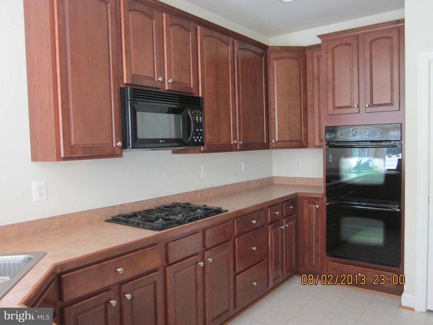 Very nice home and ready to move into! Enjoy Bulle Rock living in this wonderful single family home that backs to woods and has a great deck to view them from! First floor master complete with walk in closet and huge super bath. Gourmet kitchen with 42 inch cabinets and all appliances to include dishwasher,microwave, side by side frig, double oven and washer and dryer. carpets will be cleaned.