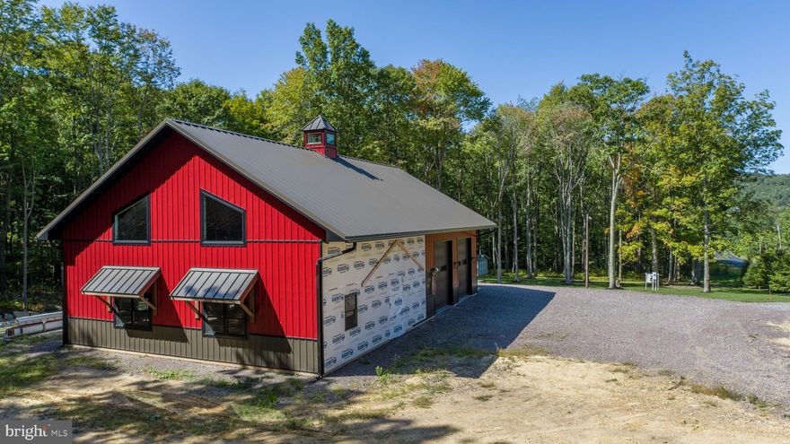 Great opportunity to finish out this 40 x 65' accessory pole building on 6.21 acres located minutes from interstate 68 at Keyser's Ridge. The quiet setting along Mill Run stream is a real bonus. All building materials on site are included with purchase. Bathroom & in floor heat tubing  installed. Spring water system is connected and operational. To Transition the building to Residential use would require additional permitting from Garrett County permits office. Call today to view this property.