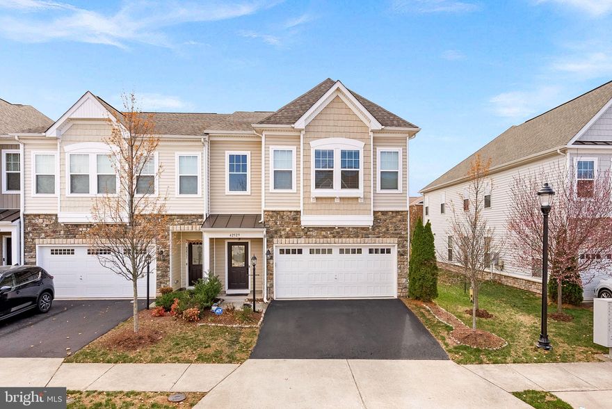 Spacious 4-Bedroom End-Unit Townhome with MAIN LEVEL BEDROOM & FULL BATH in Sought-After Brambleton Community
<BR>
<BR>
Discover this beautifully maintained end-unit townhome offering over 2,500 sq. ft. of living space in the highly desirable Brambleton community. This spacious home features 4 large bedrooms and 3 full bathrooms, including a main-level bedroom and full bath—perfect for guests or multi-generational living.
<BR>
<BR>
The upgraded kitchen boasts sleek stainless steel appliances, granite countertops, and ample cabinet space. Hardwood floors run throughout the main level, adding warmth and elegance to the open-concept design.
<BR>
<BR>
Enjoy outdoor living in the fenced-in backyard with a patio and shade structure, ideal for relaxing or entertaining. A two-car garage provides convenience and ample storage.
<BR>
<BR>
As a resident of Brambleton, you'll have access to HOA-included perks such as basic cable and internet, trash and snow removal at no extra cost. The community also features numerous parks, nearly 20 miles of scenic trails, and five outdoor pools.
<BR>
<BR>
Don't miss your opportunity. Schedule your tour today!