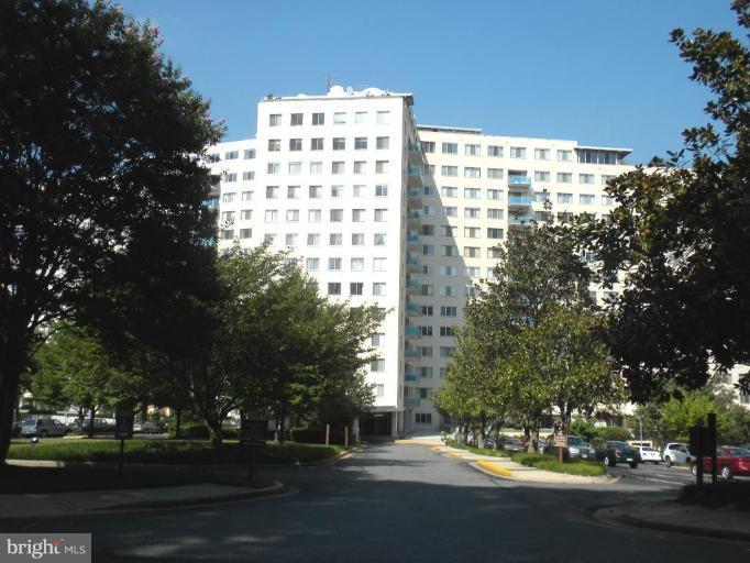 One of the largest One Bedroom Units with 3 Walk In Closets & Garage Space-Close to Elevator & Very, Very Good Condition-Walk to Metro & large GROCERY STORE-Front Desk Manned 24 Hours A Day-ALL UTILITIES INCLUDED INCLUDING TV SERVICE PLUS SWIMMING POOL/EXERCISE ROOM-BEAUTIFUL GROUNDS & BALCONY-BEAUTIFUL HARDWOOD FLOORS-NICE BALCONY WITH LOVELY VIEWS