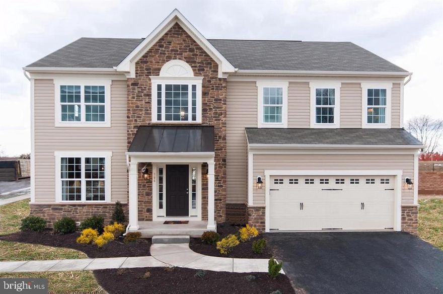 This listing is for a TO BE BUILT HOME.This stunning new construction Colonial will be constructed by MasterCraft Homes, formerly known as Regional Homes of Maryland. Showcasing their Mayfair model (choose between the OG Mayfair or the Modern Farmhouse Mayfair!), this beauty features 4 spacious bedrooms, 2.5 baths, and a 2 car attached front-loading garage. As you approach this estate, you’ll notice the elegant stone watertable and colonial porch, giving the exterior a timeless and classic look. Step inside and you’ll be greeted by beautiful luxury vinyl plank flooring throughout, combining both style and durability. With a 2-foot extension on all three levels, this home provides extra space and comfort in every room. The heart of this home is the gorgeous eat-in kitchen with stone countertops. Best of all, all of the sparkling stainless steel kitchen appliances are included, making your move-in a breeze. Whether you’re hosting a dinner or enjoying a quiet meal, this kitchen is designed for convenience and style. Upstairs, the primary bedroom is a true retreat. It features upgraded tile in the bathroom and a generously sized walk-in closet, perfect for all your storage needs. This home is custom-built, allowing you to put your finishing touches on it to truly make it your own. The basement is a blank canvas, offering endless possibilities. Whether you envision a home gym, theater, or extra living space, you have the freedom to create the perfect area for your needs. Located on a private lot in a great location, this home offers peace and privacy while still being close to everything you need. Whether you’re looking for space to relax or entertain, this home has it all. Don’t miss out on the chance to build your dream home—schedule a visit today! Pictures represent a past Mayfair model, not actual site or home.