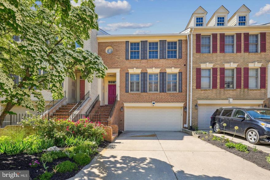 Welcome to the Mains! This elegant and stylish 3BR/2.5BA features a cathedral ceiling, decorative fireplace, designer renovated kitchen custom cabinets, and quartz waterfall counters. Gleaming hardwood flooring can be found throughout the main level plus an office/den that opens up to a Georgetown-style patio.
A spa-inspired primary suite on the upper level includes walk-in closets, heated floor in the bath suite, double sink vanity and separate shower and jetted tub. Two additional bedrooms on the same level with an additional full bath. The finished lower level offers space for a home gym, creative studio or media room, plus laundry with full size washer and dryer, and half bath. Access to the two garage with lots of additional storage! Carpet installed, high efficiency HVAC, solar panels and lets not forget to mention that the community offers swimming and tennis!