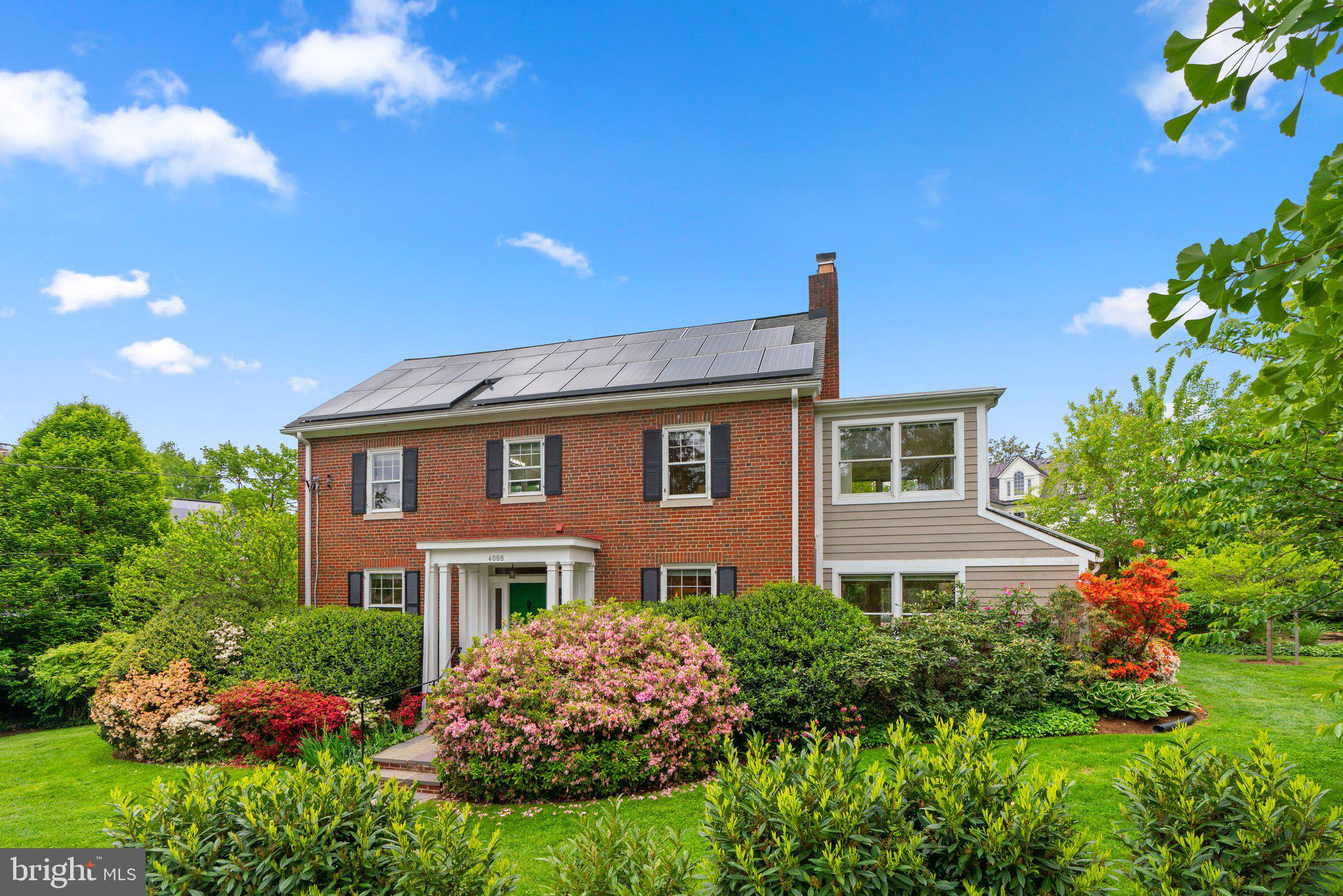 Come explore this delightful expanded corner lot home in the desirable Town of Chevy Chase. This wonderful home features expansive indoor and outdoor space. With two massive solar arrays, enjoy living with a smaller carbon footprint.
Enter into this classic 1928 Center Hall Colonial and you will immediately be enchanted by its history. The main floor features a formal dining room, kitchen and breakfast room, half bath, expansive living room with built in shelving and a wood-burning fireplace. Walk through the family room to the sunroom addition- lined with windows on three sides that gaze out onto the mature gardens lush with azalea, hydrangea, daffodils, peonies, wisteria, and young magnolia, holly and Damson plum trees. Grow your own veggies in the organic beds that await. Entertain on the patio featuring a wooden pergola. There is lots of room to garden and play, and even a gated section for little ones.
Upstairs you'll find four bedrooms, including a primary with built ins and ensuite bath plus a bonus sun drenched office, a hall bath and a linen closet. On the top level you'll find huge closets and cupboards plus a fifth bedroom. The basement has a finished rec room with a wet bar, built in desk space, a full bath, laundry room and so much storage! Walk out basement and up stairs to the rear yard. Off street parking for this home in the deep driveway or the wide garage.
Stroll or scoot to downtown Bethesda to enjoy scores of fabulous restaurants, movies and nightlife. The Town of Chevy Chase features many amenities for its residents. Just around the corner you'll find the Chevy Chase Country Club for endless rounds of golf, tennis and more.
Recent updates include refinishing the hardwoods, paint, two new A/C systems, and many newer appliances. This is the one you have been waiting for! They just don't make them like this anymore.