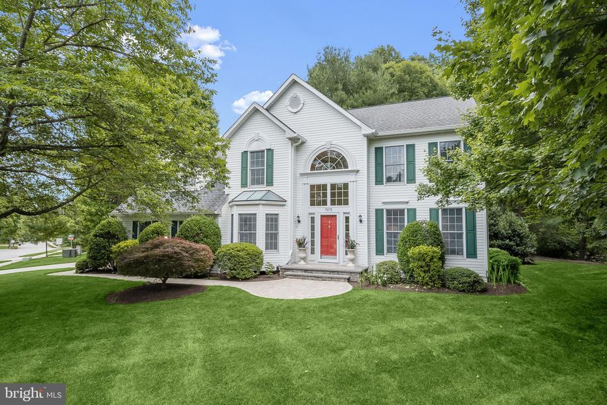 All Offers due Monday, July 3rd 2pm. Welcome to 7075 Garden Walk, an exquisite over 4,000 square foot former model home nestled in River Hill! Perfectly situated on a premium corner lot of 0.45 acres, this unforgettable property offers well-curated living spaces with sophisticated moldings, lofty windows, soaring ceilings, hardwood flooring, upgraded lighting fixtures, generous room sizes, design-inspired finishes, and so much more. The two story foyer is a wonderful welcome to this elegant home, catching your eye immediately with sidelights and wainscoting. Anchored by the foyer is the lovely formal living room graced by intricate crown molding. Opposite the formal living room you are invited into the formal dining room, a perfect entertaining area well-suited for celebratory meals. Inspire your inner chef in the well-appointed kitchen with granite counters, stylish white cabinetry, pantry, planning station, island, and stainless steel appliances including a wall oven. The kitchen also provides a breakfast room for casual dining. A sliding glass door off the breakfast room opens to the screened composite porch, an ideal spot for al fresco dining or simply enjoying the serene surroundings. Adjacent to the kitchen is the show stopping family room highlighted by a vaulted ceiling, palladian windows, cozy wood burning fireplace, and wall of built-ins. Work from home with ease in the home office with French doors. The laundry room with storage cabinetry concludes the main level. The substantial upper level is an exciting collection of 4 bedrooms, and 2 full baths. Retreat to the luxurious primary suite that offers a decadent cove ceiling, sitting room, walk-in closet, and en-suite bath. The primary bath showcases a double vanity, soaking tub, and separate shower. The 3 additional bedrooms share a full hall bath that has been updated with honeycomb tile flooring and vibrant glass subway tile. The sprawling lower level presents opportunities for hobbies, recreation, and fitness and offers multiple storage closets. Fall in love with the beautiful landscaping and wooded view that provide a perfect backdrop for outdoor entertaining on the paver patio and fire pit area. Ideal Village of River Hill location convenient commuter routes, schools, shopping, dining, and entertainment options. Property Updates: Oak hardwood floors to family room, refinished main level hardwood floors, dishwasher, pendant lighting, remodeled hall bath, and more.
