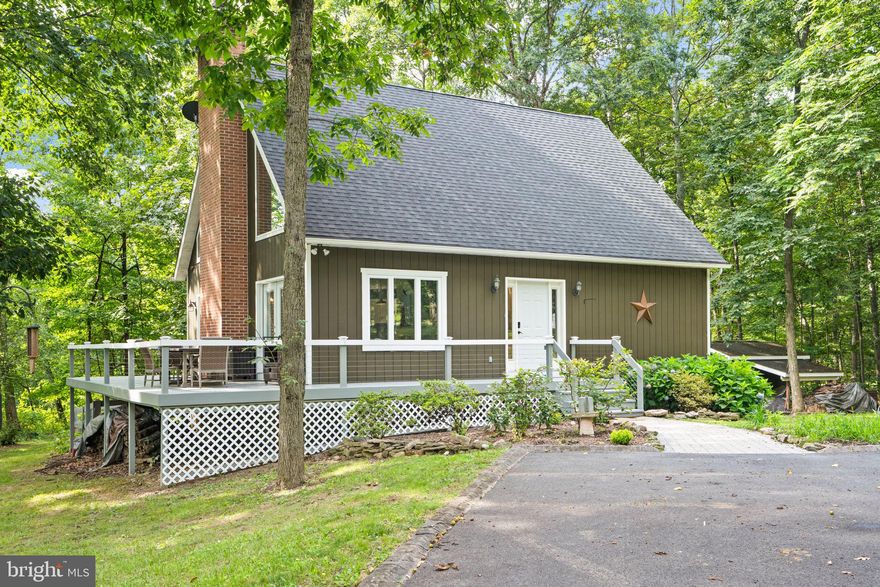 Welcome to this beautiful home sitting on 1.16 acres, with a fenced in back yard, tree house and close to the MD line and Ski Liberty Resort.  The Foyer/Hallway has hooks for Skis and Ski Boots. The basement has been remodeled and a 3rd Bedroom added.  In 2022 a New Roof, New HVAC, and a New Water System were installed.   The bathroom on top floor was remodeled  in 2022.  French Doors off the Living and Dining Rooms leading to the deck were installed in 2023 as well as a new Hot Water Heater.