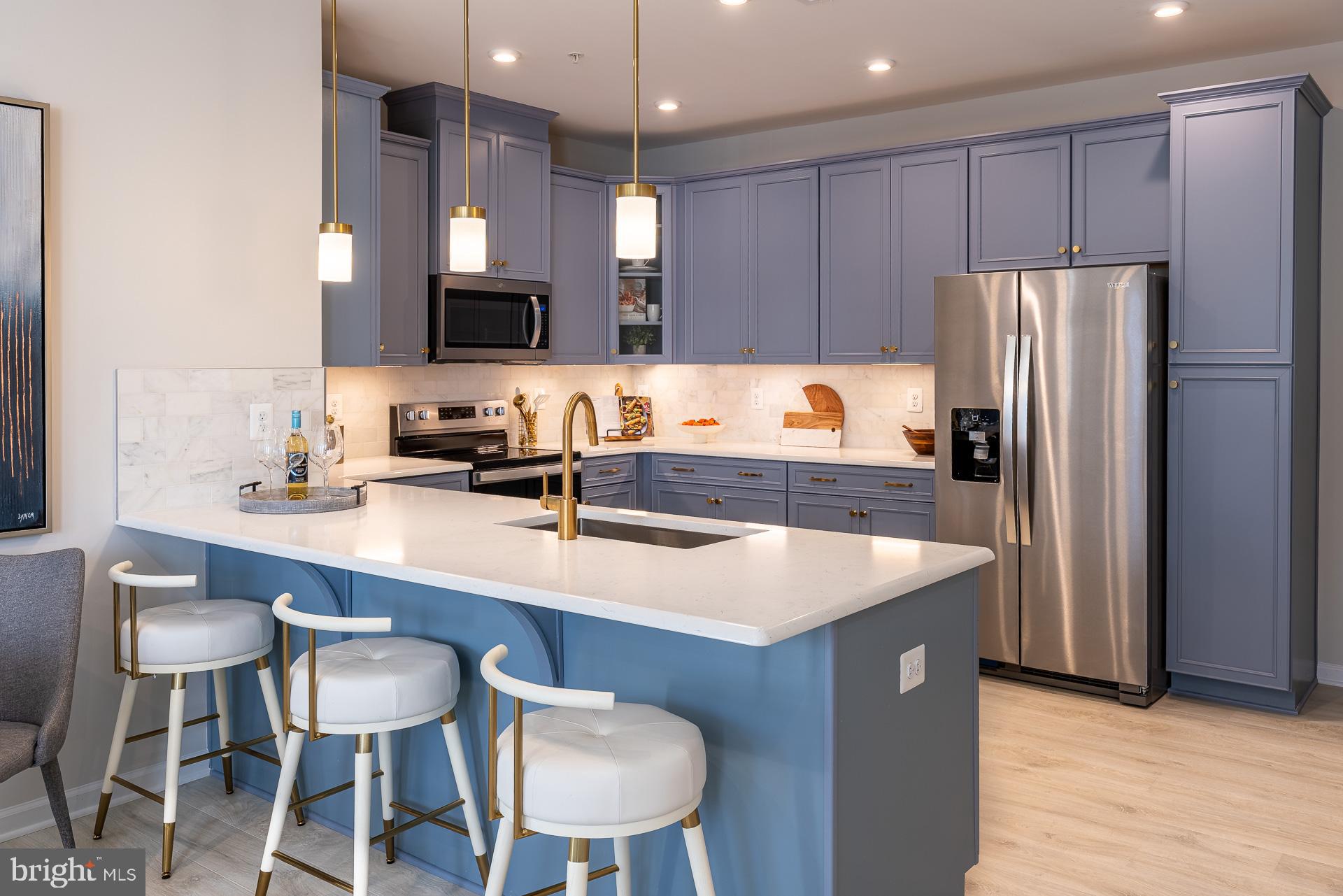 Discover Upscale Living at Paddock Pointe. Nestled in the heart of Howard County, Paddock Pointe offers a sophisticated, metropolitan-inspired lifestyle with unbeatable convenience. Enjoy easy access to commuter routes, scenic walking trails, a community dog park, and more! Experience modern living in these luxurious two-story condos with attached garages—schedule your tour today! Enjoy this lower level, 1-car garage condo in Laurel's Paddock Pointe community! The Riva features a spacious kitchen with plenty of cabinets and counter space, as well as, Whirlpool stainless steel appliances. The kitchen connects to the great room which offers plenty of natural light and grants access to the second floor. Upstairs enjoy a conveniently located laundry room and your choice between 3 bedrooms or 2 bedrooms and a loft. The primary suite features a spa-inspired bath and a large walk-in closet that is bound to impress! *This listing reflects the base pricing for the Riva model on a to-be-built lot in the community. *Photos are of the decorated model home. *Pricing, features and, availability subject to change without notice. MHBR No. 93. 2021 Beazer Homes.