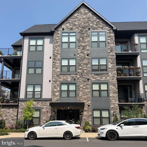 Photo of 23650 Havelock Walk Terrace #407, ASHBURN, VA 20148 (MLS # VALO2131476)