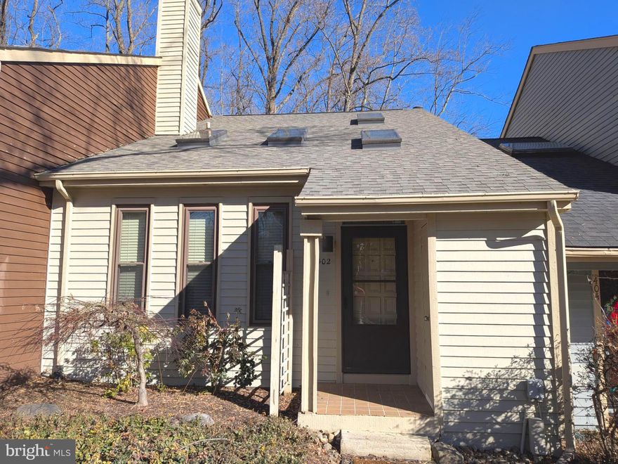 Nestled in the sought-after Woods Landing community, this completely renovated two-story townhouse offers the perfect blend of modern comfort and serene living. A main-level master suite features an en-suite bath with a new granite-top double vanity and a walk-in closet. An inviting living room with vaulted ceiling is centered around a cozy fireplace, and flows into a formal dining space—ideal for entertaining. The versatile upstairs loft with built-in bookshelves provides a perfect spot for a home office or reading nook. The renovated kitchen boasts granite countertops, brand new stainless steel appliances, and stylish finishes. Additional highlights include new flooring and paint throughout, a spacious rear deck with new floorboards and railings, and major energy-efficiency upgrades, including a brand new roof and HVAC system. Enjoy exceptional community amenities including tennis courts, walking paths to the Magothy River, picnic areas, playground, and boat storage. Located in the highly regarded Broadneck school district, this home offers comfort, convenience and an opportunity to savor the outdoors—whether kayaking on the river or relaxing on your private deck.