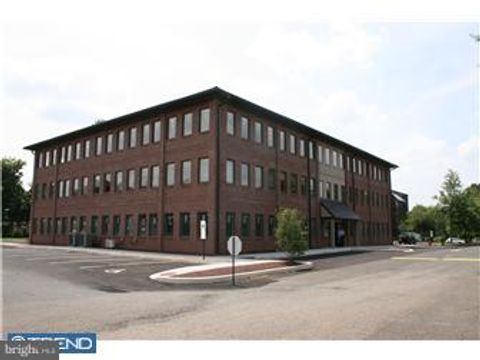 Photo of 370 E Maple Avenue #302, LANGHORNE, PA 19047 (MLS # PABU2099600)