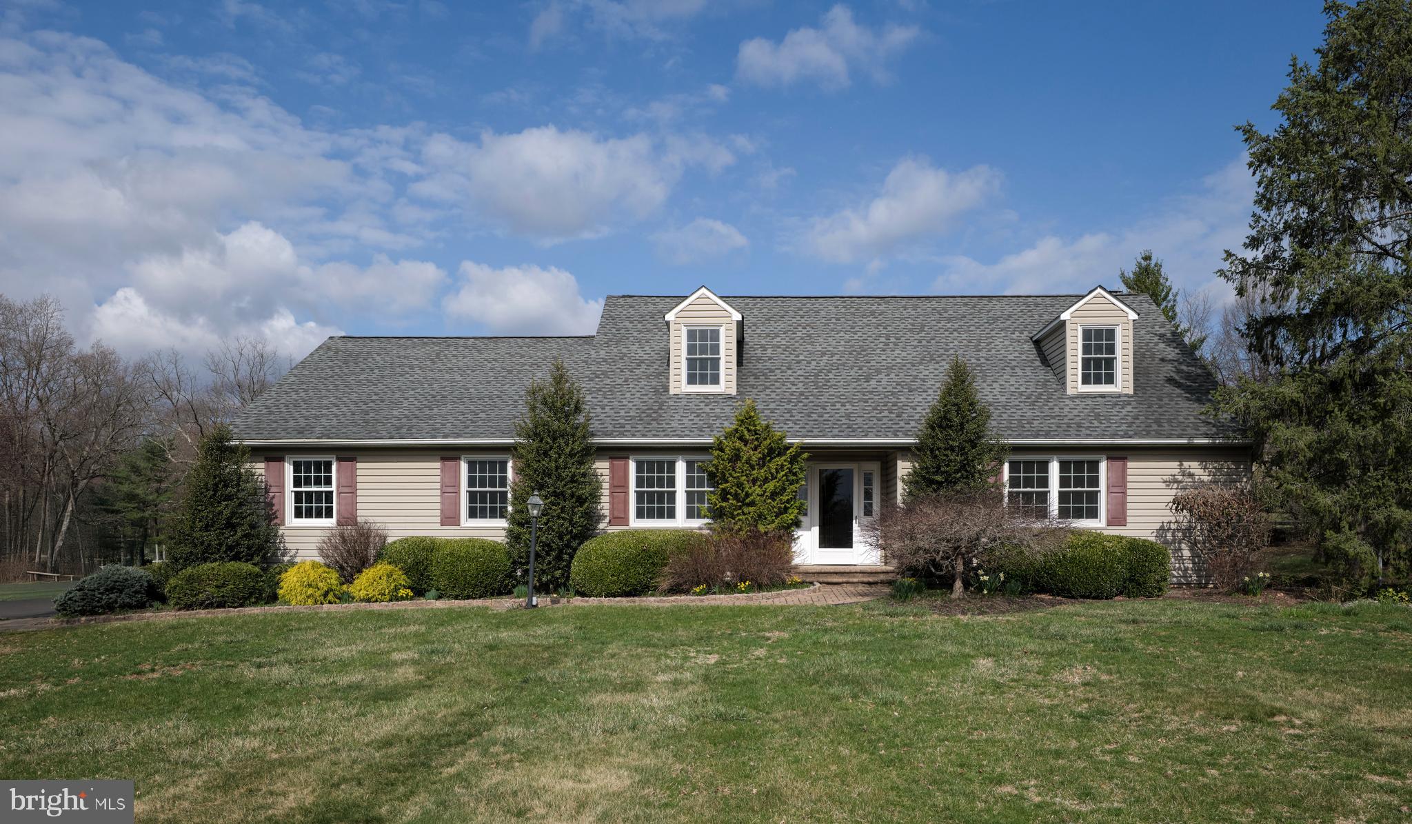 Charming Cape in Buckingham Township - Welcome to 4902 Anderson Road. A long driveway leads you to this 4 bedroom, 2.5 bath single-family home in the heart of bucolic Buckingham Township. This beautifully maintained property offers 2720 square feet of living space and sits on a sunny 2.93 acre lot. This center hall entry home features a main floor ensuite with full bath, spacious walk in closet and long distance views. To the left of the entry is your dining room and eat-in kitchen with views of the backyard. The family room overlooks the mature landscape through a large bay window and features a brick gas fireplace with temperature control. An office/craft/play room and first floor laundry (with Bosch appliances) offering access to the rear screened-in porch round out the first level. The second level features another dual vanity full bath with tub/shower combo and 3 generous sized bedrooms all featuring generous walk in closets and one with attic access for extra storage. Enjoy outdoor living at its finest with a generous screened-in back porch that has screens and windows for extended use, fenced, in-ground pool, landscaped garden with stone water feature and lots of flowering bushes and mature trees. There is also a large garden shed and a fenced garden for the gardening enthusiast. An ideal backyard retreat! This home has a full basement with Bilco doors to the backyard and a two-car garage featuring an epoxy sealed floor. Set across from rolling Bucks County farmlands and centrally located between Doylestown and New Hope this home is located in the Central Bucks School District. Don’t miss the opportunity to make it yours!