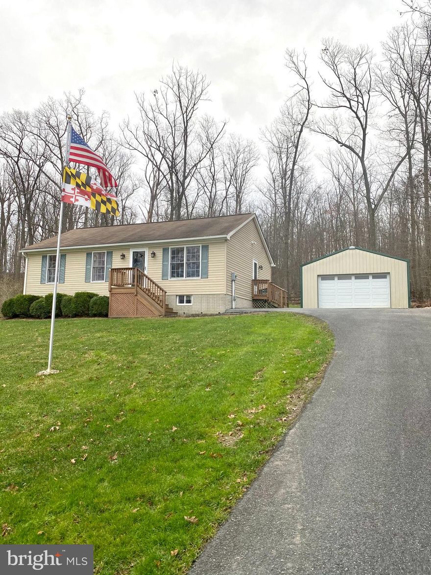 What a perfect gift, just in time for the holidays. This 2005 updated rancher is just what you have been waiting for. The first thing you will notice is the private hilltop setting overlooking stunning preserved farmland which has the most beautiful sunsets. Enter inside off the side door off driveway, or front door with by way of sidewalk. The bright main level living area features newly installed vinyl wood flooring & neutral tile in the kitchen. The updated kitchen  hosts granite countertops, updated backsplash, ample cabinet space, full pantry, & deep oversized farmers sink. Need additional table space? The kitchen island is removable, and there is a conveniently located breakfast bar with pendant lighting. The master bedroom has a generously sized closet and master bathroom w/ recently upgraded shower & vanity. The remaining two bedrooms are of great size, and can be found sharing a large hall bathroom with updated vanity and linen closet. The basement features tall ceilings, ample storage space, laundry room, oversized living area, and two bonus rooms - perfect for private online learning, office, home gym, or additional bedroom. Basement has outside access through a bulkhead stairway. The backyard can be accessed through a sliding door in the kitchen. Fully fenced w/ storage shed, fire pit, patio, and plenty of room for outdoor entertaining. A recently built 28x32 outbuilding is perfect for the car/bike hobbyist, or additional storage. Come and tour this beauty, it won't last long!