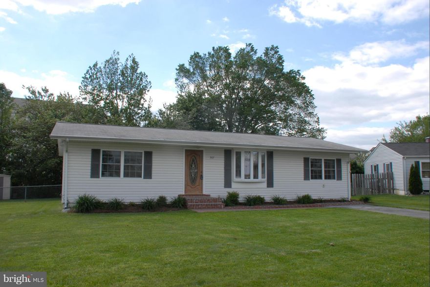 Conveniently located in the heart of LaPlata.  Walking distance to shops, restaurants, school & office buildings.  Rambler floor plan with wood laminate floors thru out.  Master bedroom separate from the other two bedrooms. open floor plan.  Fenced back yard.