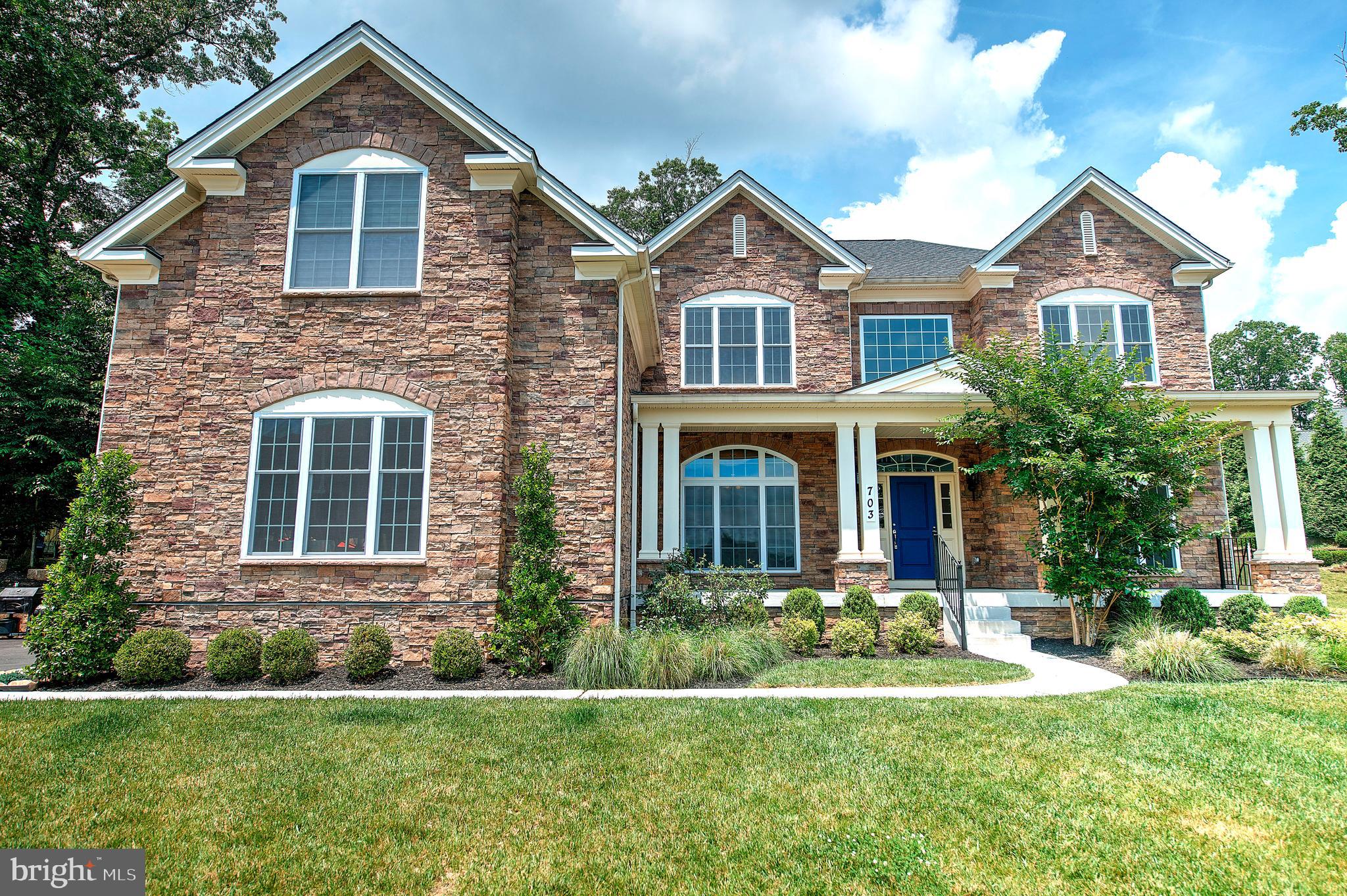 Beautiful, like new (2017) stone front Toll Brother Colonial with expansive front porch on a .63 acre cul de sac lot! Over 6600 finished sq ft and over $150K in options and upgrades including a 3-car side load garage, wide plank hardwood on main level, Upgraded Mold “Heritage Trim Package”, Solarium off of Gourmet Kitchen (with Butler’s Pantry, Wine Fridge, Drop Zone, Granite & Stainless appliances), Expanded Family Room with “Box Beam” ceiling and gas FP, elegant Library with custom full wall bookcase cabinetry, fully finished lower level with a fabulous 2 BR, 1 Bath IN-LAW SUITE with 2nd gourmet kitchen! Upper level features Huge Primary Suite complete with spacious Bedroom with tray ceiling, Sitting Room, THREE Walk-In Closets, Dressing Area and SPA BATH with separate vanities! Truly a MUST SEE!