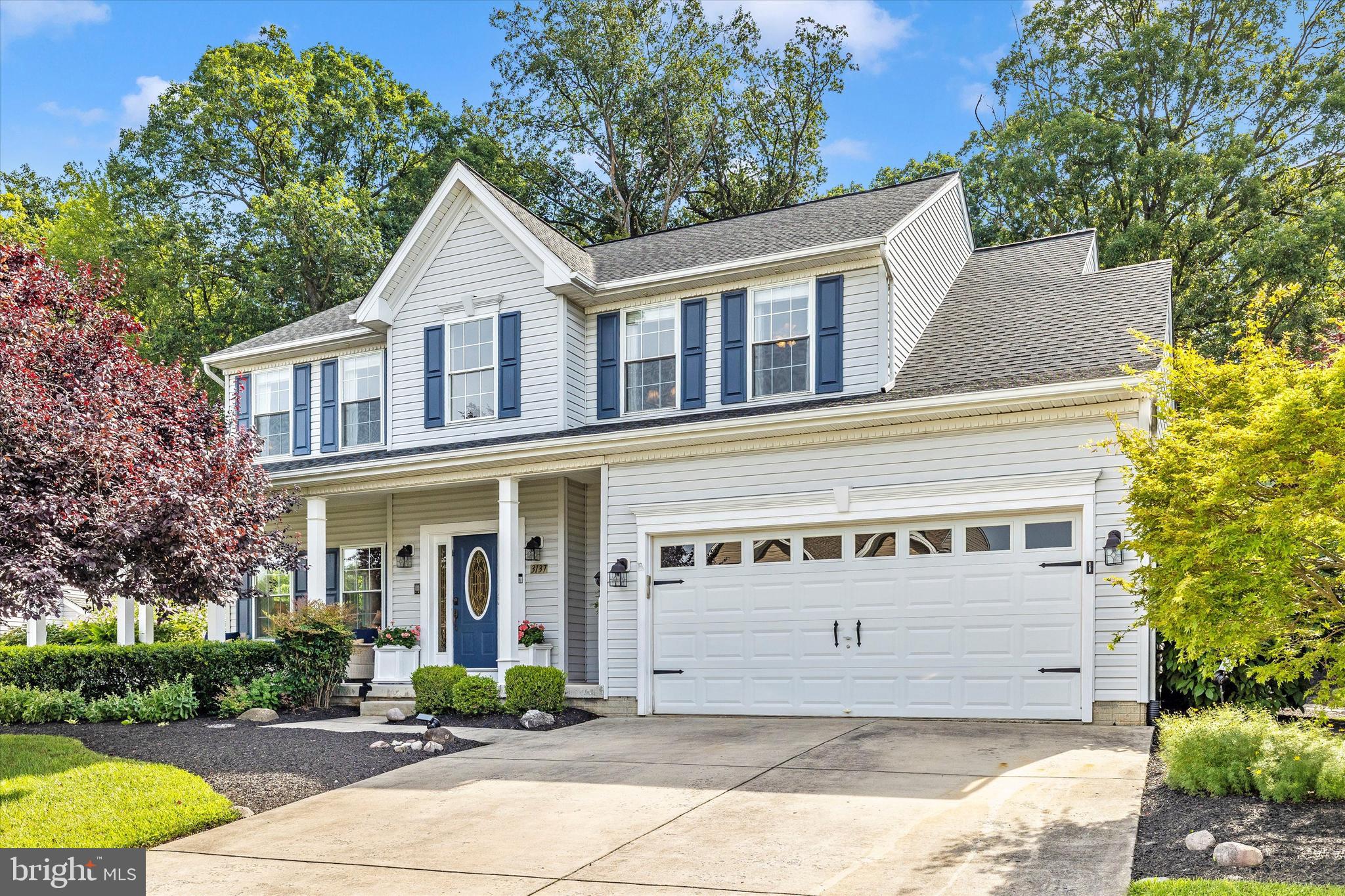 Don't miss your chance to own a gem in popular Manchester Farms, with no HOA restrictions!
This stunning 4-bedroom, 3.5-bath Colonial offers over 3,400 sq ft of beautifully finished living space, perfectly blending timeless charm with modern upgrades. From the moment you arrive, the wrap-around front porch and lush landscaping set a warm, inviting tone.
Inside, you'll find crown molding and wainscoting throughout, along with gleaming hard wood and luxury vinyl plank floors. The heart of the home is the elegant kitchen featuring Corian countertops, soft-close cabinets, high-end black stainless appliances including a SmartThings refrigerator and a gas stove with Wi-Fi connectivity, as well a custom mudroom for practical everyday living. Enjoy cozy evenings in the family room, which is open to the kitchen and features a gas fireplace, or relax in the sunroom with views of the wooded backyard. You'll also appreciate the formal living room and formal dining room—perfect for entertaining or everyday elegance.
Upstairs, you’ll find the convenient second-floor laundry for easy living, along with a spacious primary suite with a vaulted ceiling, a large walk-in closet, and an en suite bath with vaulted ceiling, complete with a soaking tub and separate shower—a perfect retreat at the end of the day. The lower level is a true entertainer’s dream, featuring a spacious rec room with direct access to the backyard, plus an incredible home theater with a custom-installed crystal screen and six individually heated and reclining Sharper Image chairs for the ultimate cinematic experience.
Step outside to your own private oasis: an expansive Trex deck with a hot tub, beautifully landscaped yard with a water feature, and direct access to the woods behind Cape Horn Park. It’s perfect for gatherings, relaxing, or enjoying nature.
Updates include: New hot water heater (2025), newer roof with 25-year warranty (installed in 2021), upgraded garage door with Wi-Fi connectivity, upgraded voice-activated smoke detectors, intercom system with music playing ability on all three floors, newer dishwasher (2023), and SmartThings refrigerator (2021).
Located in a desirable neighborhood with excellent schools, shopping, and recreation nearby, this home truly has it all.