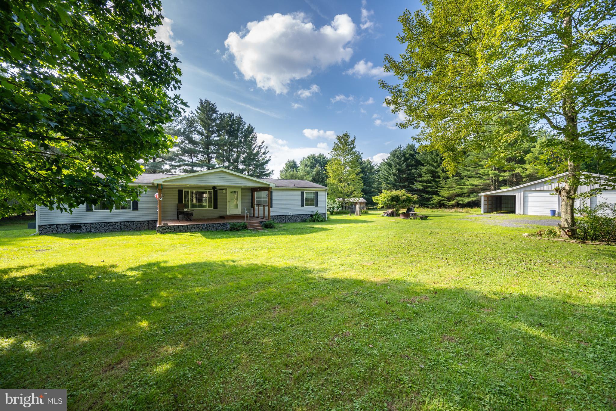 Charming 3 Bedroom Ranch Home on 20 Private Acres & Stream.
Experience peace and privacy with this well-maintained 3-bedroom, 2-bath ranch-style home, perfectly situated on 20 scenic acres featuring a mix of woods, open fields & stream. This one-level home offers a spacious layout with a primary suite that includes a double vanity and soaking tub for ultimate relaxation.
Additional features include a dedicated office, a cozy den, and plenty of natural light throughout. Outside, you'll find an oversized detached 2-bay garage with attached carport, plus a shed for extra storage. Whether you're looking for a private retreat, hobby farm potential, or just room to explore, this property offers endless possibilities. Schedule your private tour today!