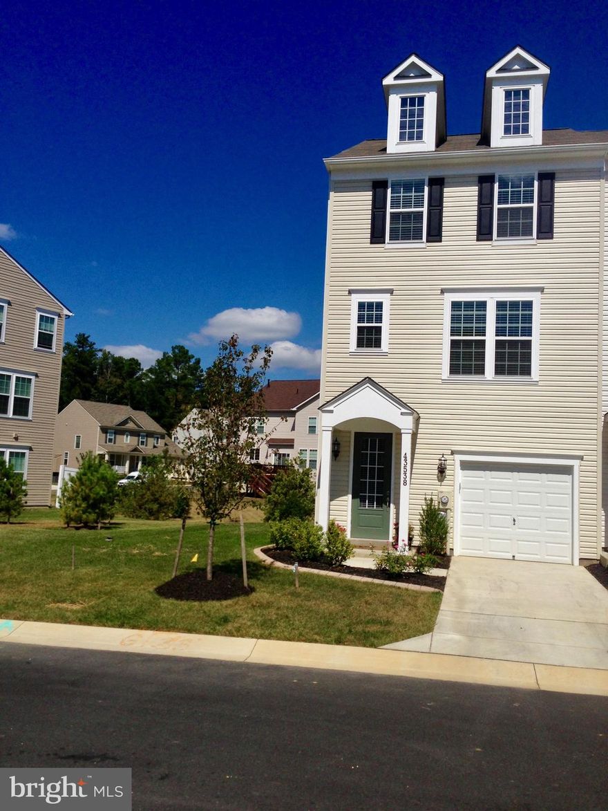 Enjoy some tranquility and privacy with this beautiful End-unit town home w/ lots of natural light!  Home is loaded with upgrades including: Low-maintenance 19x12 Composite Deck w/privacy lattice, enjoy some morning coffee and a newspaper on the 18x7 custom pavers patio on lower level, custom crown molding, chair-rail detailing throughout kitchen/dining area, French door on bonus room, Benjamin Moore professional color pallet choices, upgraded Berber carpeting throughout, custom garage shelving, and more!  2-10 Home warranty is active and transferable.  Will not last; come check it out before it s too late!